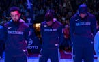 Memphis Grizzlies players bowed their heads in a moment of silence to honor Tyre Nichols ahead of their game against the Minnesota Timberwolves Friday