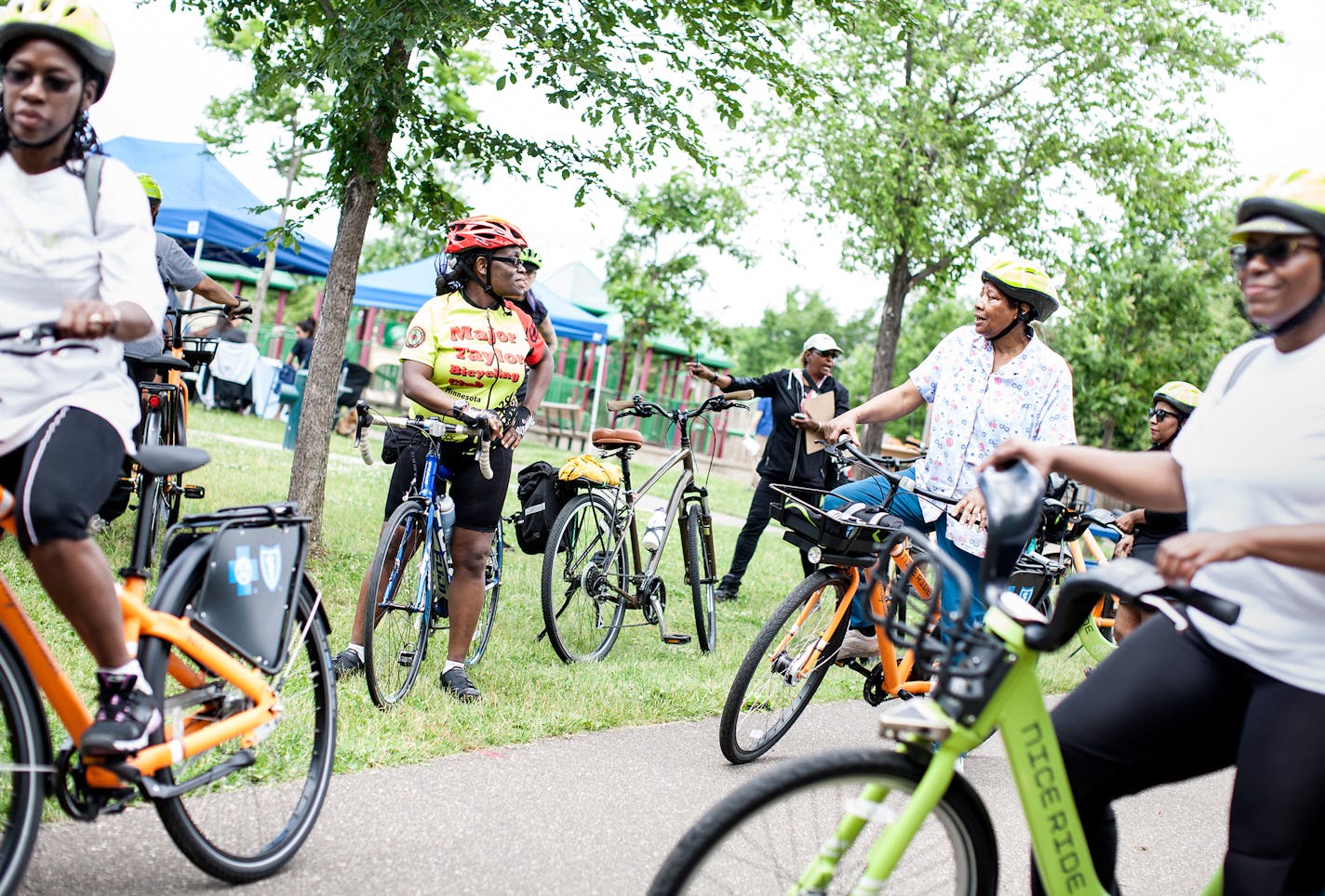 Rose Yarns, 73, second from right, participates in a group bike ride at the Twin Cities Juneteenth festival at North Mississippi Regional Park in Minneapolis June 20, 2015. The recreational ride was a collaboration amongst Nice Ride, the Major Taylor Bicycling Club, and Blue Cross and Blue Shield. The Juneteenth festival observes the June 19th 1865 proclamation of the abolition of slavery in Texas and celebrates freedom for people of all racial backgrounds. (Courtney Perry/Special to the Star Tribune)