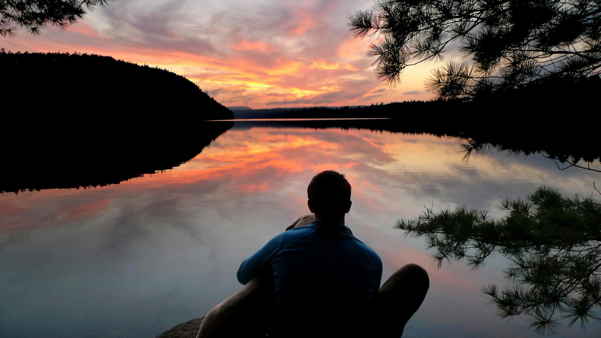 Aidan Jones and his dog Crosby took in a sublime sunset over John Lake in the Boundary Waters Canoe Area Wilderness.