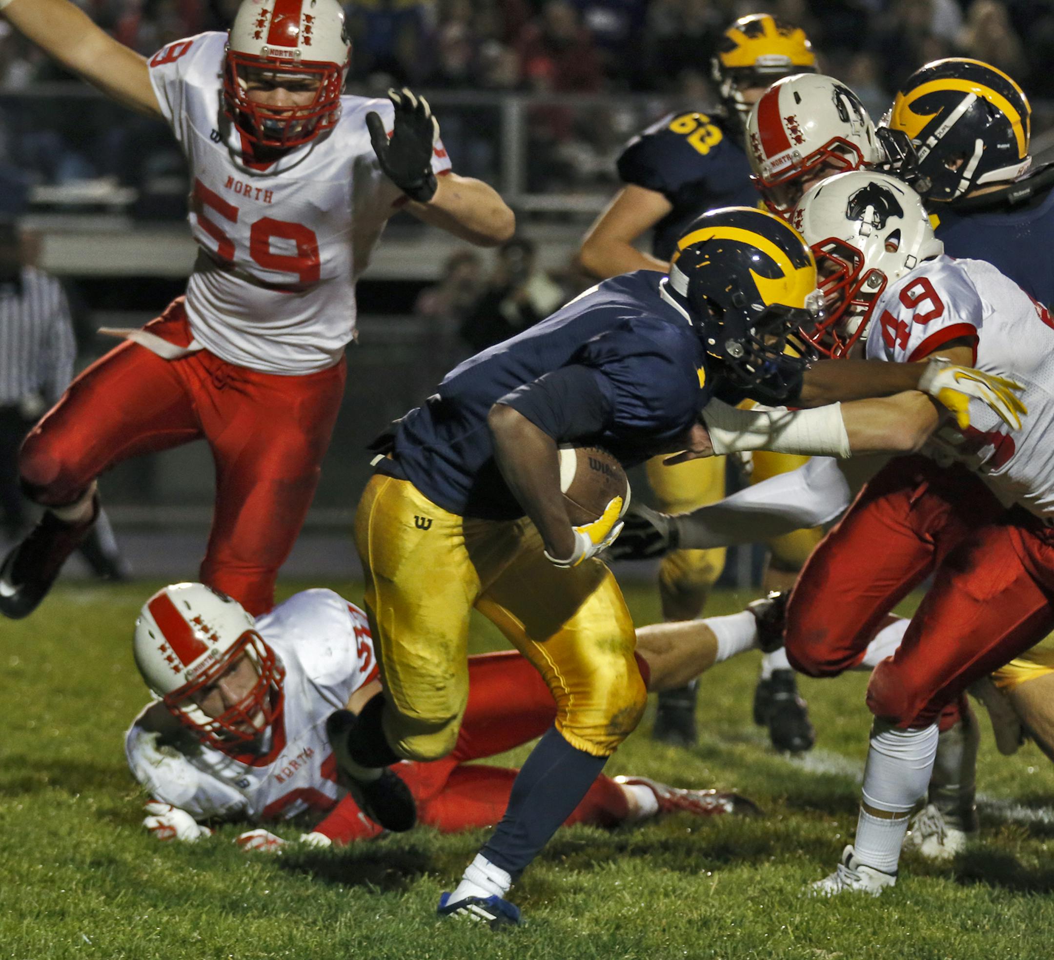 Rosemount vs. Lakeville North prep football. Rosemount running back Dimitri Williams outran Lakeville North defenders on a first half rushing play. . (MARLIN LEVISON/STARTRIBUNE(mlevison@startribune.com)