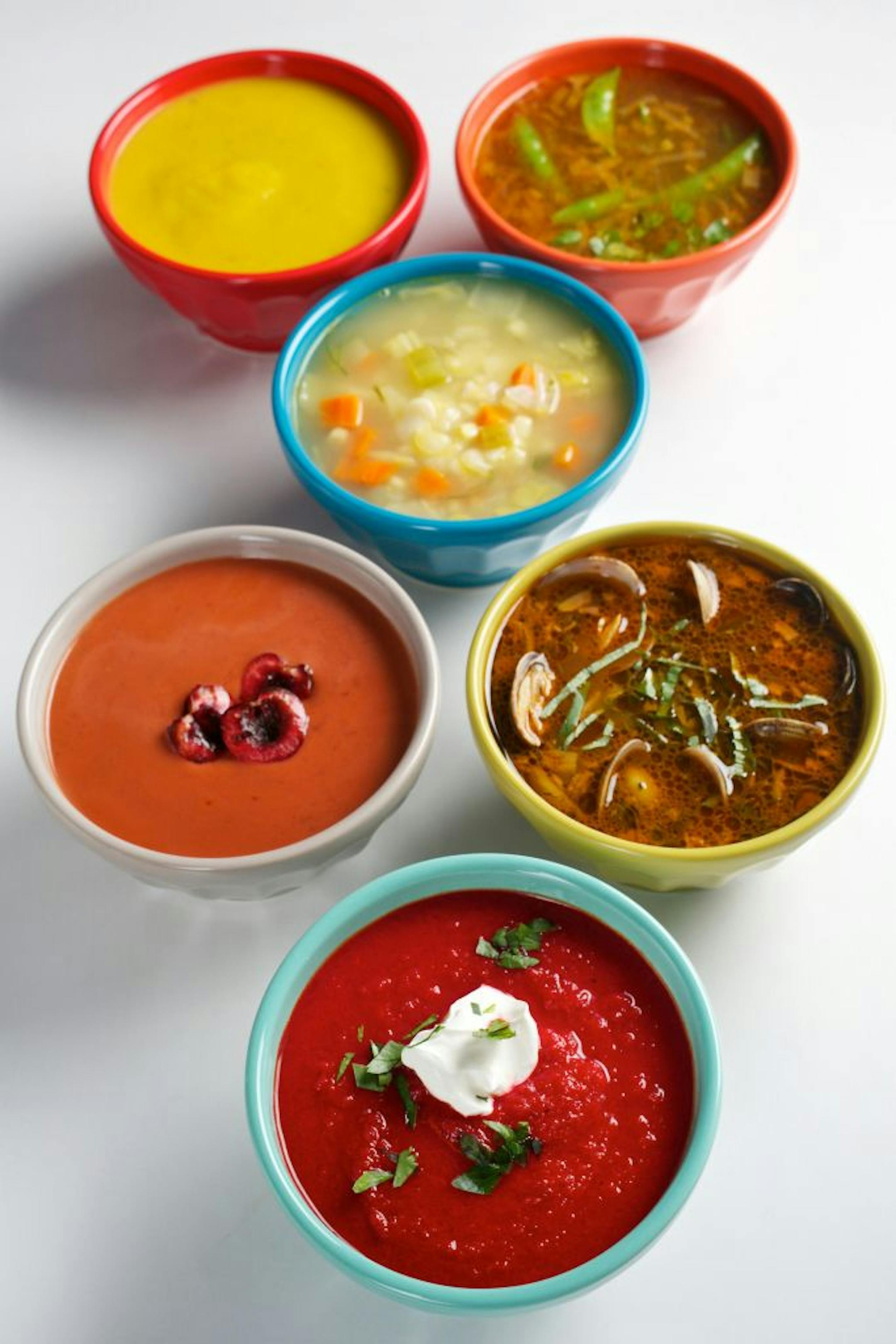 Summer soups. Clockwise, from top left: Cold Yellow Zucchini Soup, French-Style Summer Pistou, Soupergirl's White Bean and Corn Soup, West Coast Manila Clams With Garlic Tomato Broth, Beet and Tomato Bisque, and Cold Cherry and Tomato Soup. Illustrates SOUP (category d), by Jane Touzalin (c) 2012, The Washington Post. Moved Tuesday, June 12, 2012.