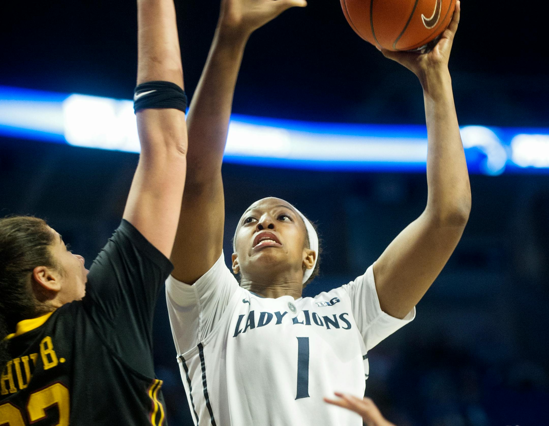 Penn State's Candice Agee goes in for a basket over Minnesota's Amanda Zahui B. on Sunday, Feb. 15, 2015, at the Bryce Jordan Center in State College, Pa. (Abby Drey/Centre Daily Times/TNS)