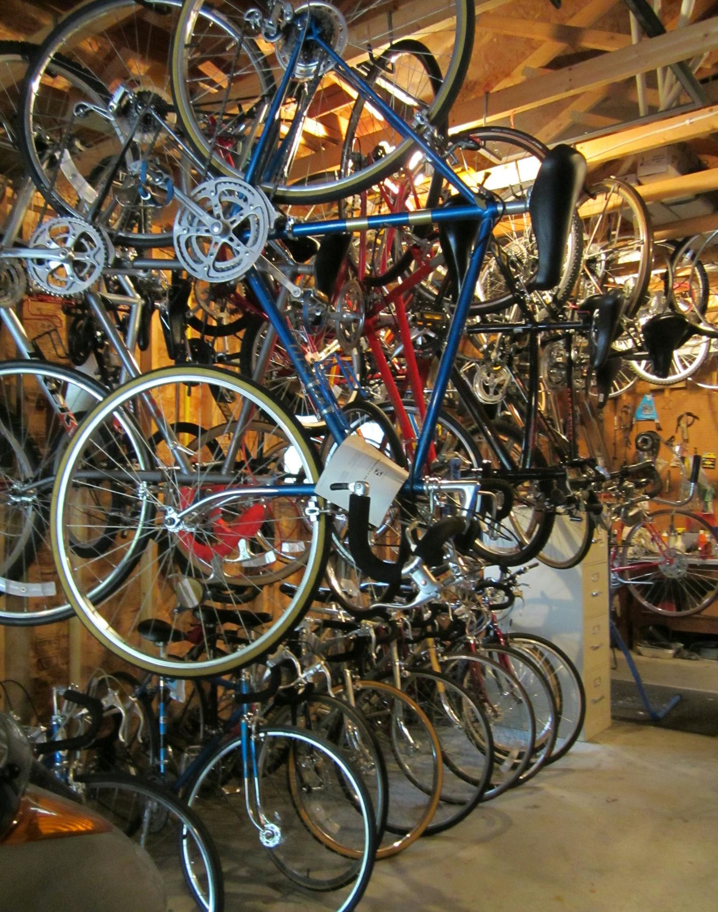 Bikes are sqeezed into every corner in Rick Anderson's Apple Valley garage. Currently, he's storing more than 50 bikes in his garage in preparation for his upcoming bike sale, which will benefit Kids 'n Kinship. Photo by Janice Bitters, Special to the Star Tribune