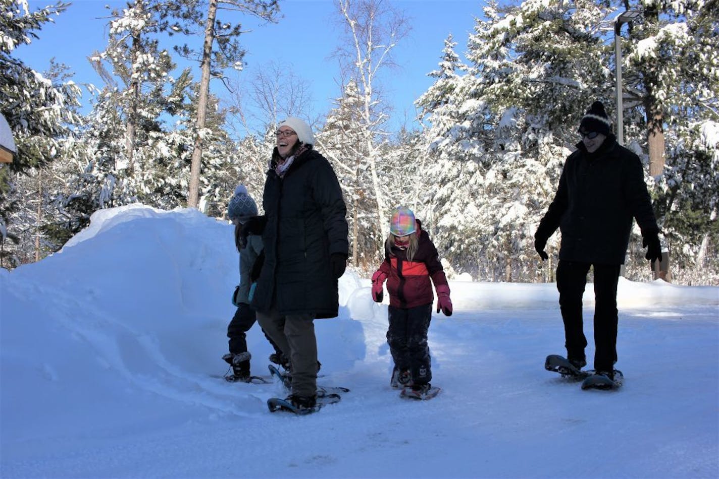 The Meissners, of Jena, Germany, went off snowshoeing for the first time Tuesday afternoon at Itasca State Park.