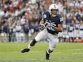 File-This Jan. 2, 2017, file photo shows Penn State Nittany Lions running back Saquon Barkley looking for room to run against USC during the first hal