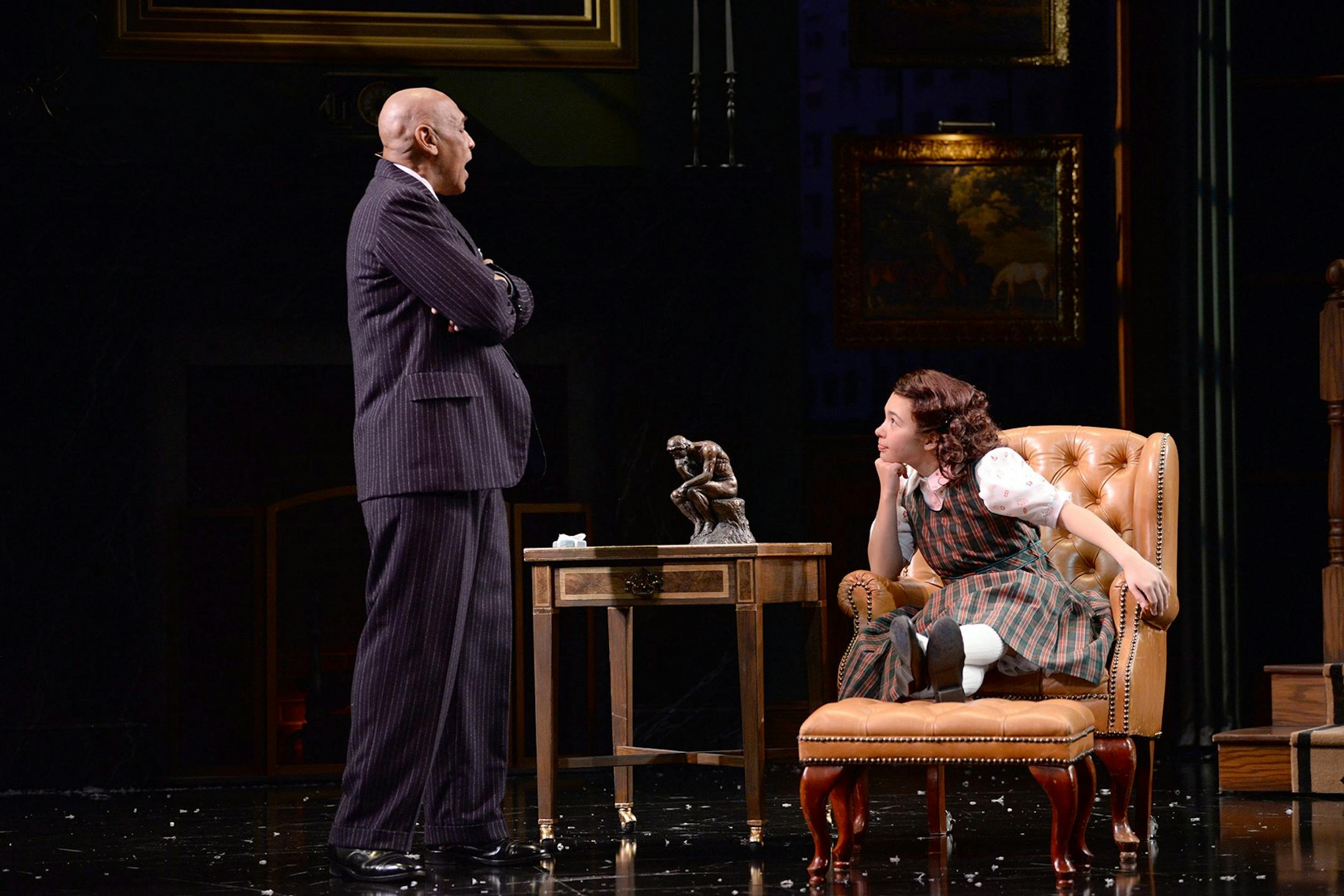 JoeNathan Thomas as Daddy Warbucks and Audrey Mojica as Annie in "Annie" at Children's Theatre Company.