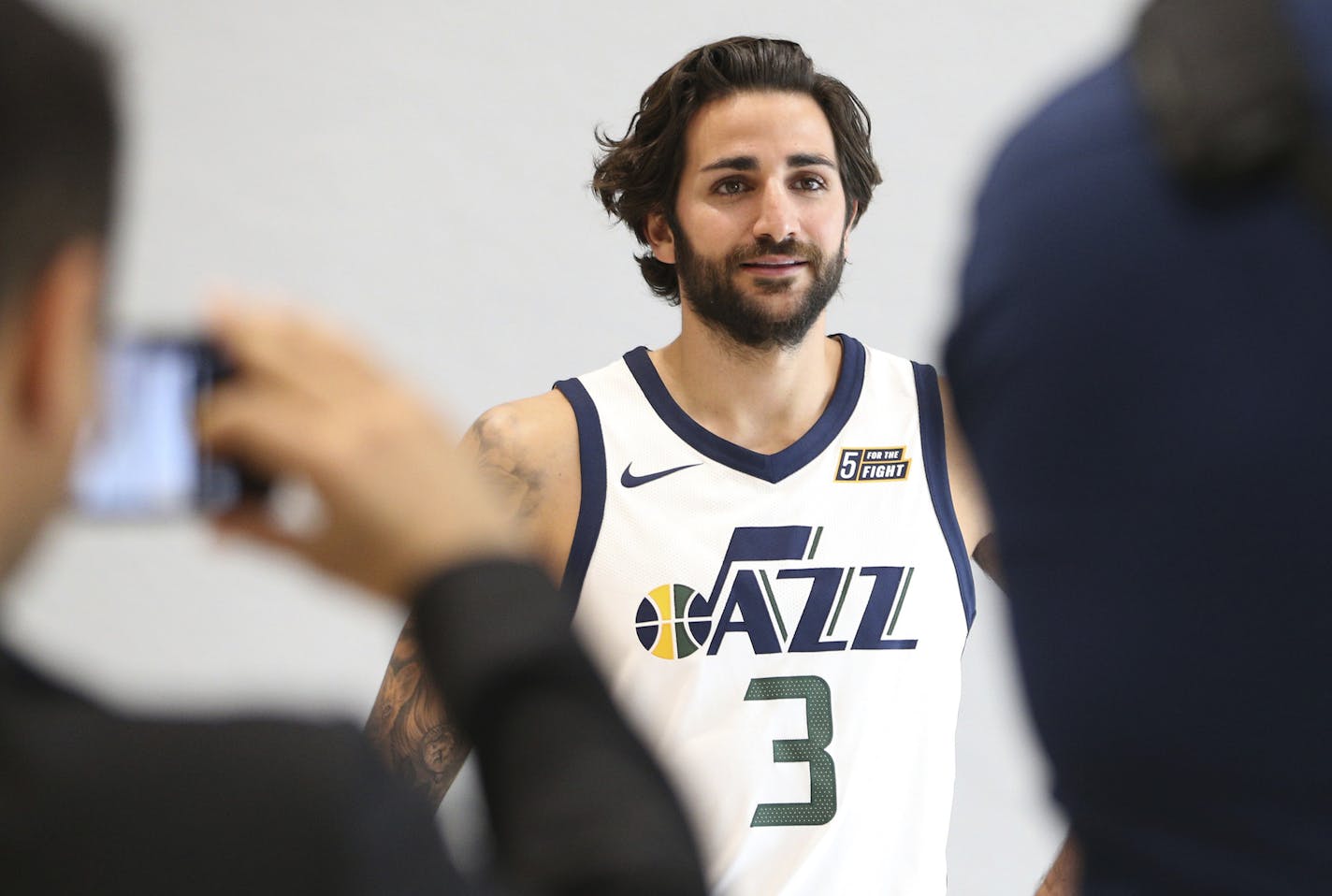 Ricky Rubio poses for pictures at the NBA's Utah Jazz Media Day, Monday, Sept. 25, 2017, in Salt Lake City. (AP Photo/George Frey)