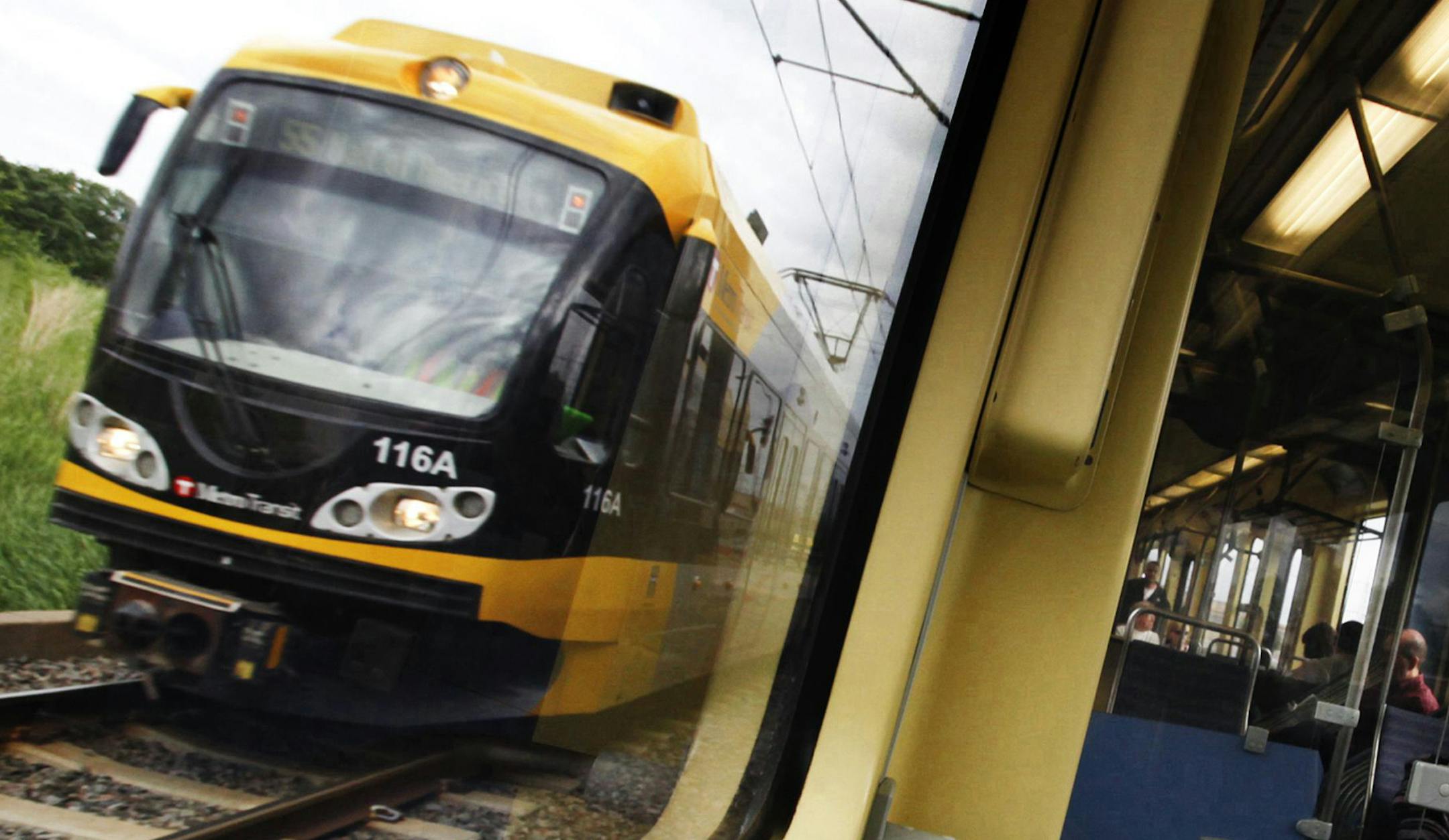 DAVID JOLES ï djoles@startribune.com -June 2, 2011- Minneapolis, MN- In this photo:] Riders take the light-rail during morning rush hour. Once derided as a ìtrain to nowhere," the Hiawatha light-rail line carries enough riders over 12 miles that it's cheaper to run than city buses. The daily cost per passenger mile of operating the Hiawatha between Bloomington and downtown Minneapolis is nearly half that of metro buses throughout the Twin Cities, according to the federal government. Th