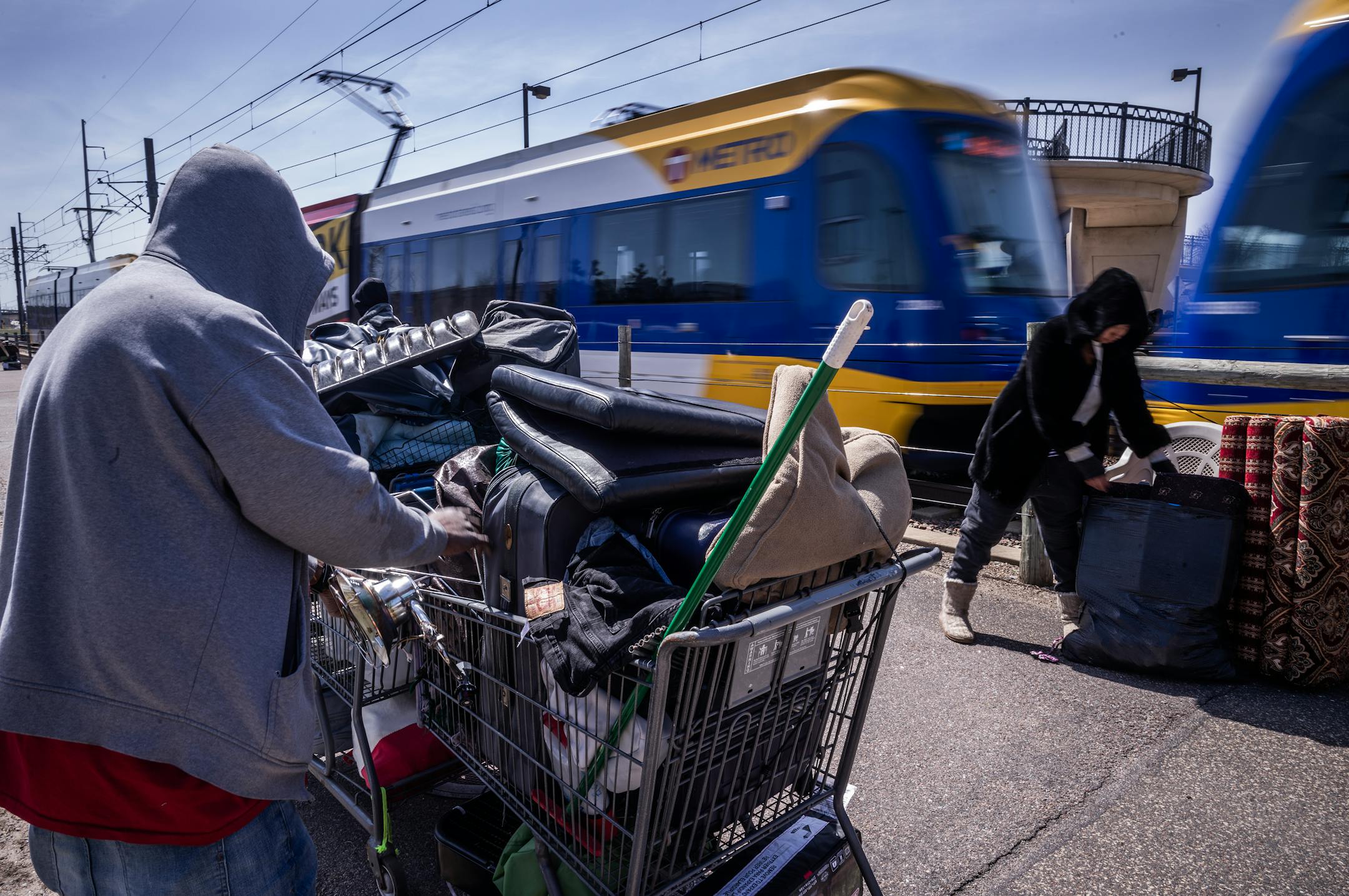 The city of Minneapolis clears out an encampment near East 24th and the Hiawatha Lightrail Trail in Minneapolis,