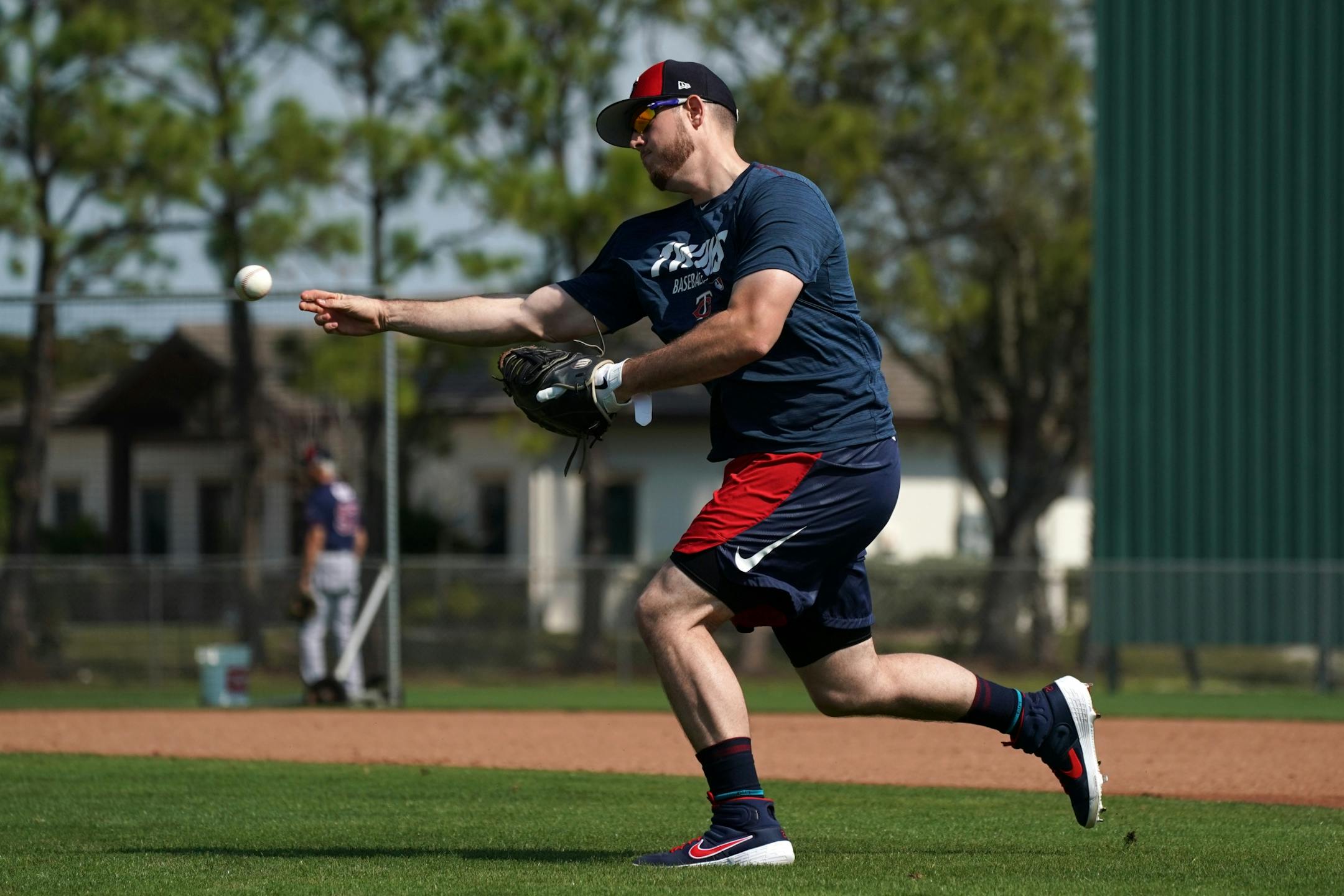 Minnesota Twins first baseman C.J. Cron (24) worked on drills with the few field players present at Spring Training Saturday.