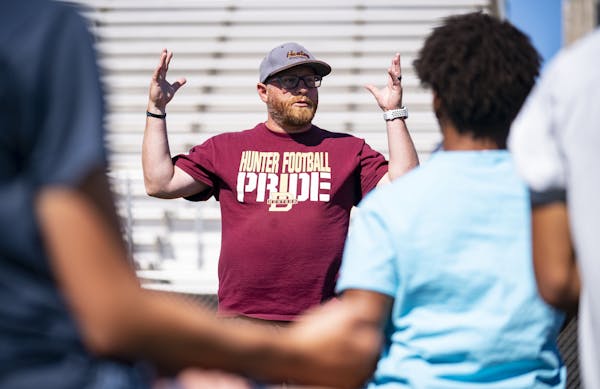 Denfeld head coach Erik Lofald talked to his team about the MSHSL decision to move football to the spring on Tuesday. ] ALEX KORMANN • alex.kormann@