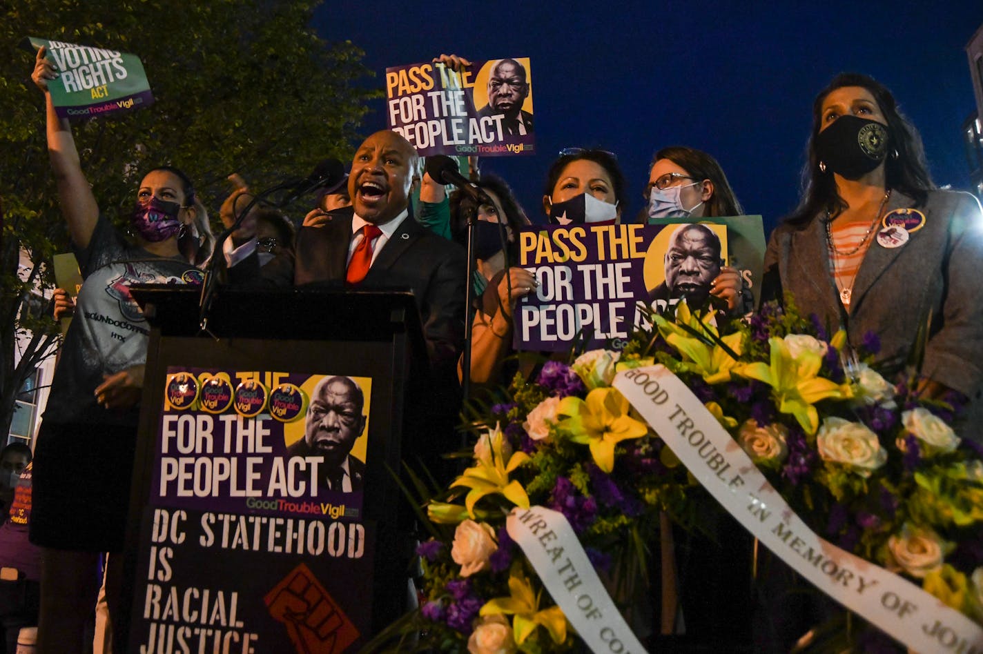 Texas state Rep. Carl Sherman, a Democrat, speaks at a voting rights rally in Washington, July 17, 2021. After at least six Texas state lawmakers tested positive for the coronavirus, the group is now confined to a Washington hotel, holding virtual meetings and making little headway in its persuasion campaign. (Kenny Holston/The New York Times)