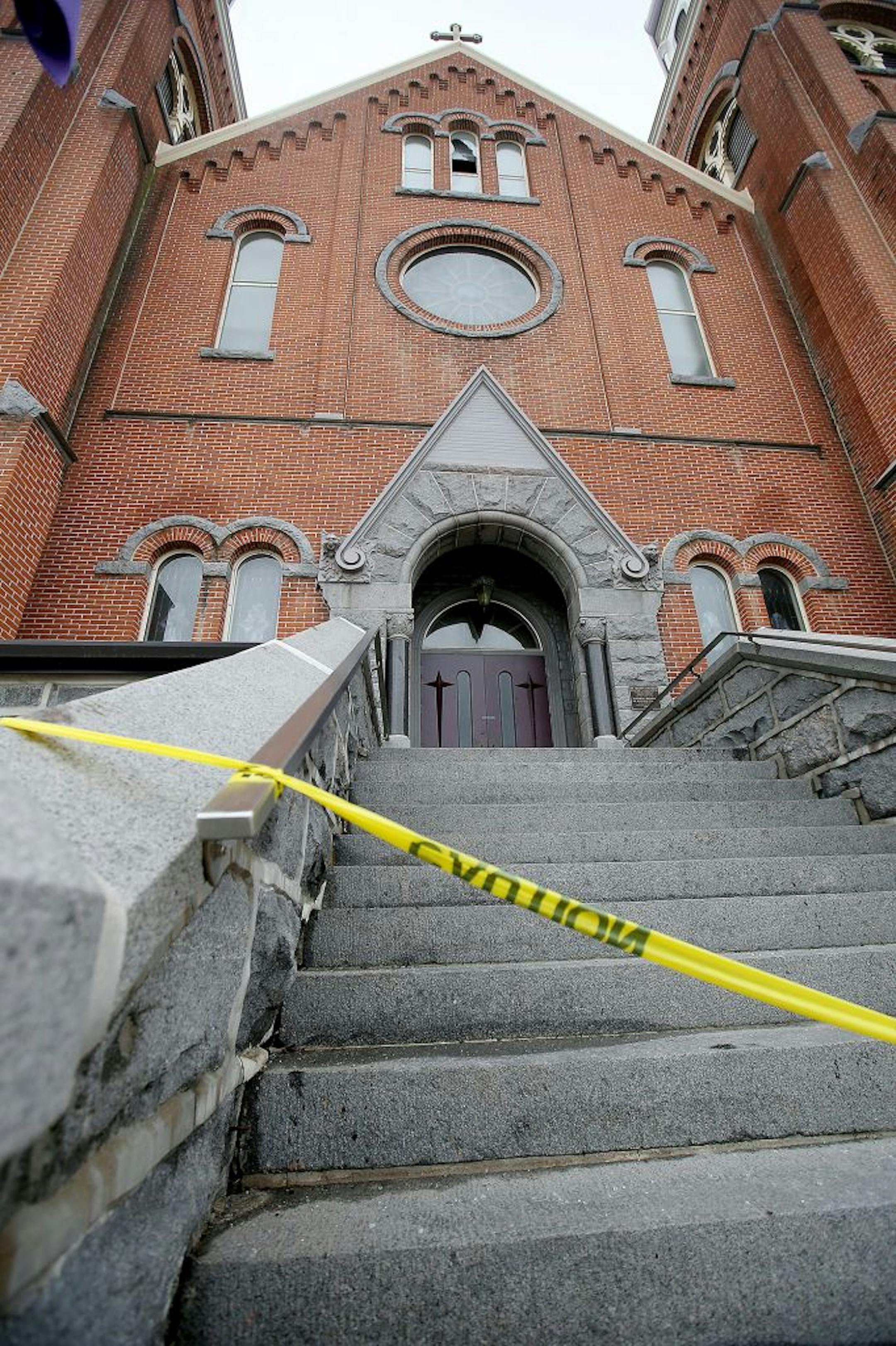 Local fire and federal agents arrived to inspect the scene where a fire damaged about 30 percent of the 120-year-old St. Mary's Catholic Church, Monday, March 14, 2016 in Melrose, MN.