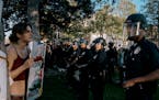 Demonstrators calling for a permanent cease-fire in the Israel-Hamas war face police sent to remove them, on the University of Southern California cam