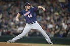Minnesota Twins starter Phil Hughes delivers a pitch during the first inning of a baseball game against the Seattle Mariners, on Saturday, May 28, 201