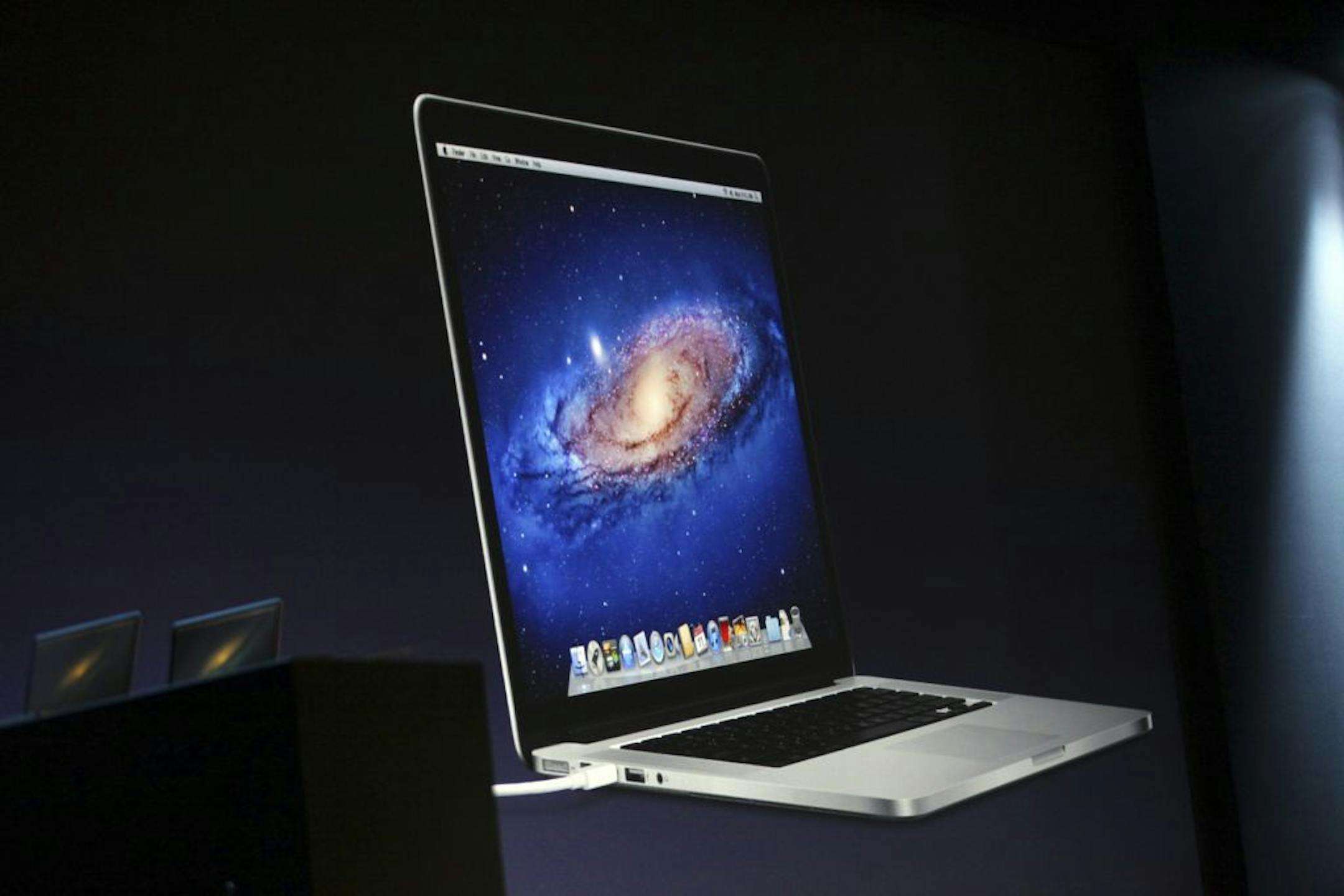 The new design for the MacBook Pro, on display, at Apple's World Wide Developer Conference at the Moscone Center in San Francisco, June 11, 2012. Apple introduced the new MacBook Pro, thinner, with a new display at the conference.