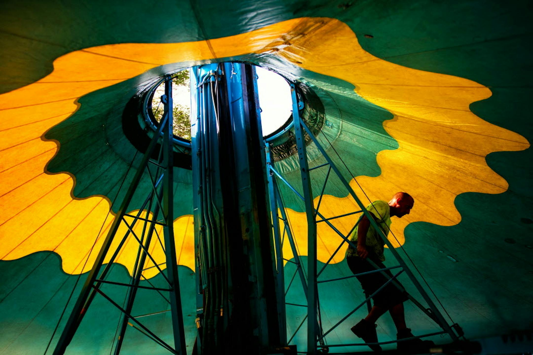 The Wave Swinger ride rose into the air at the State Fair Midway in 2014.