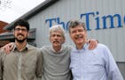 Art Cullen, center, editor and co-owner of the Storm Lake Times, posed for a photo with his son, Tom, left, and brother, John, outside the paper in St