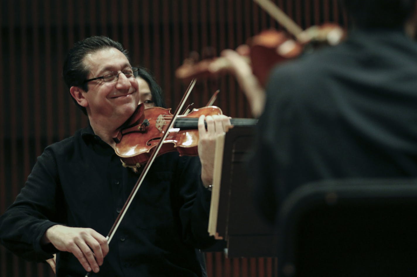 Associate Concertmaster Ruggero Allifranchini seemed to be pleased during the Saint Paul Chamber Orchestra's first rehearsal in the Ordway's nearly completed new concert hall, a space designed specifically for the more intimate acoustic needs of a chamber orchestra and its audience. The hall is a project of the Arts Partnership, comprising the Ordway, SPCO, Schubert Club and Minnesota Opera. ] BRIAN PETERSON &#x201a;&#xc4;&#xa2; brianp@startribune.com St. Paul, MN - 12/10/2012