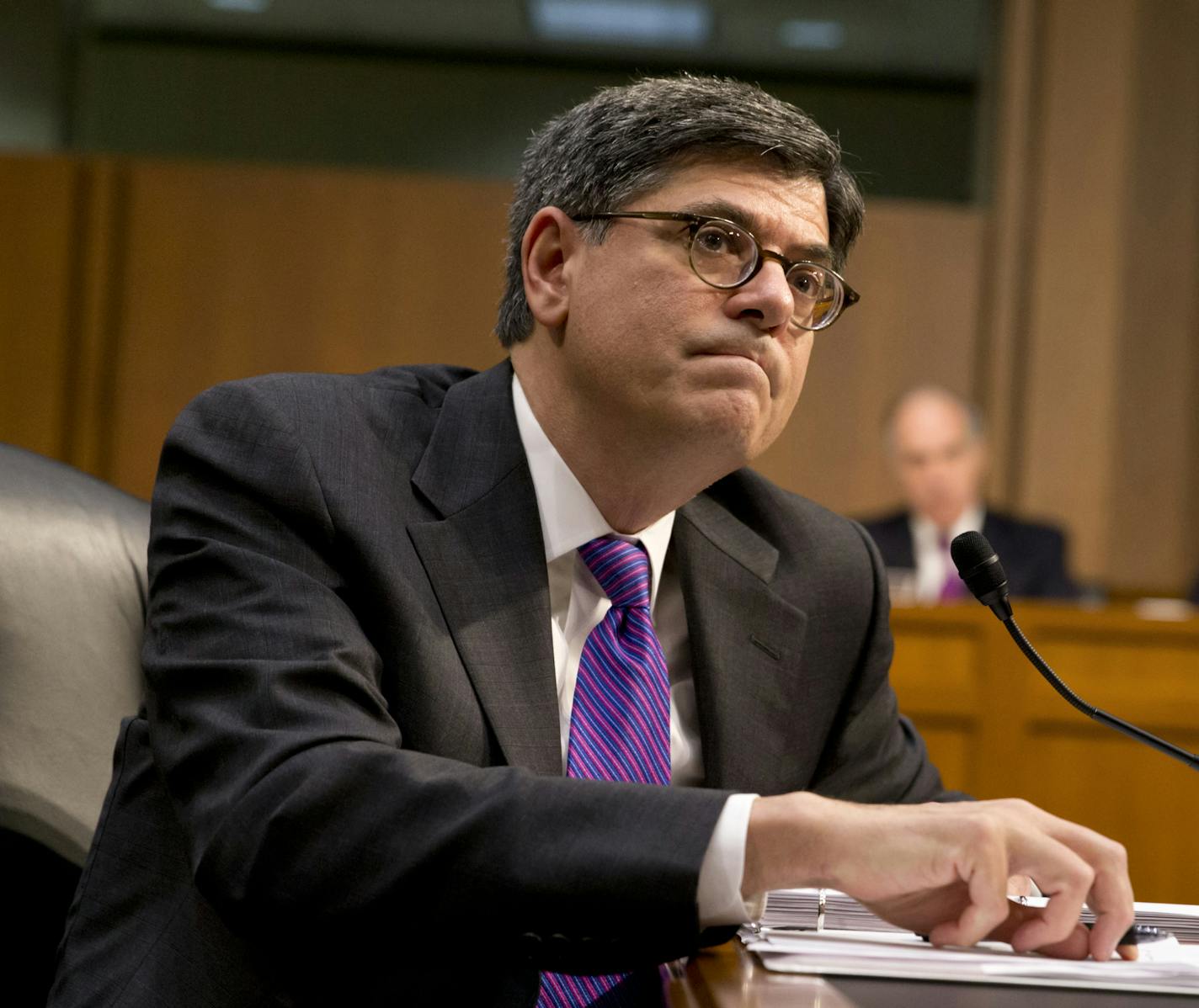 FILE - In this Oct. 10, 2013 file photo, Treasury Secretary Jacob Lew listens while testifying on Capitol Hill in Washington. One bit of gospel is endlessly recited in the debt limit standoff: The United States has never defaulted. But history's not that simple. America has briefly stiffed some of its creditors on at least two occasions: subsequent to the War of 1812, the U.S. Treasury stood empty in 1814, Washington lay in ruins, and even the soldiers fighting the British weren't getting paid;