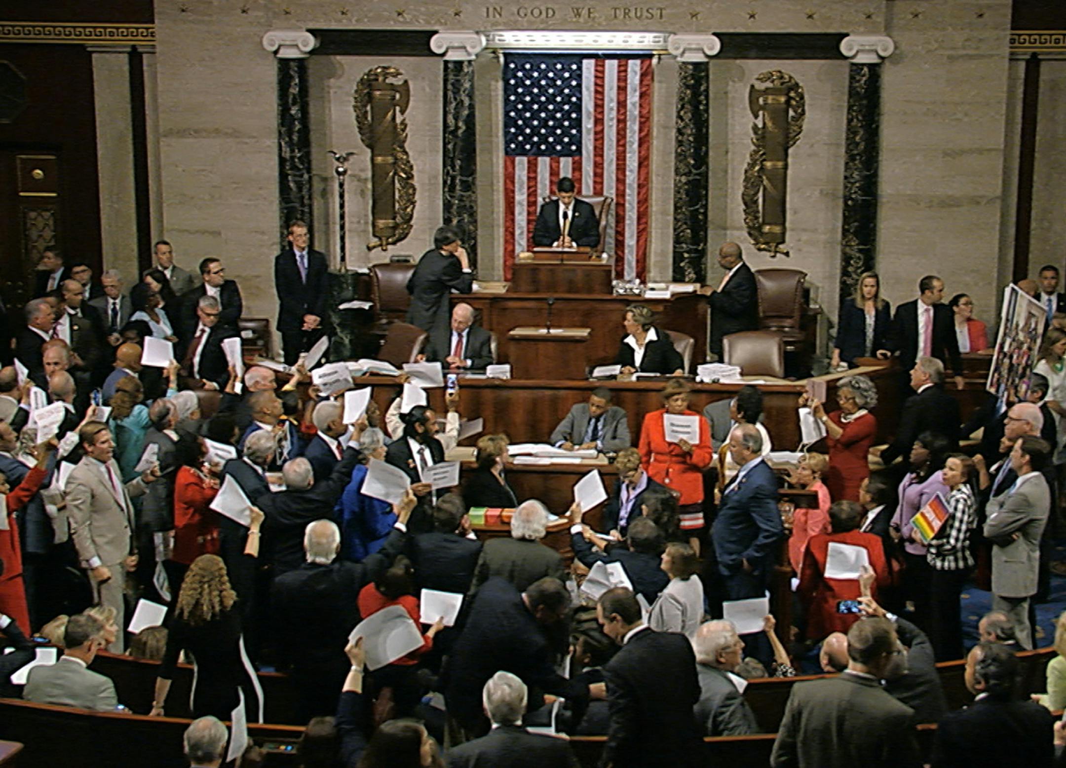 In this image from video provided by House Television, House Speaker Paul Ryan stands at the podium as he brings the House into session Wednesday night.