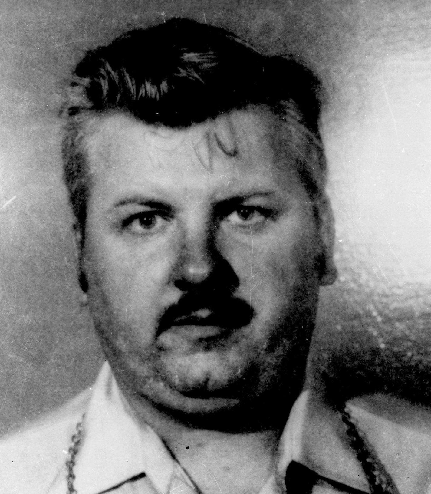 FILE - This 1978 file photo shows serial killer John Wayne Gacy. More than 30 years after a collection of decaying bodies was found beneath John Wayne Gacy&#xed;s house, detectives have secretly exhumed the remains of eight young men who were never identified in the hopes that DNA testing can solve the last mystery of one of the nation&#xed;s most gruesome serial killers. (AP Photo/File)