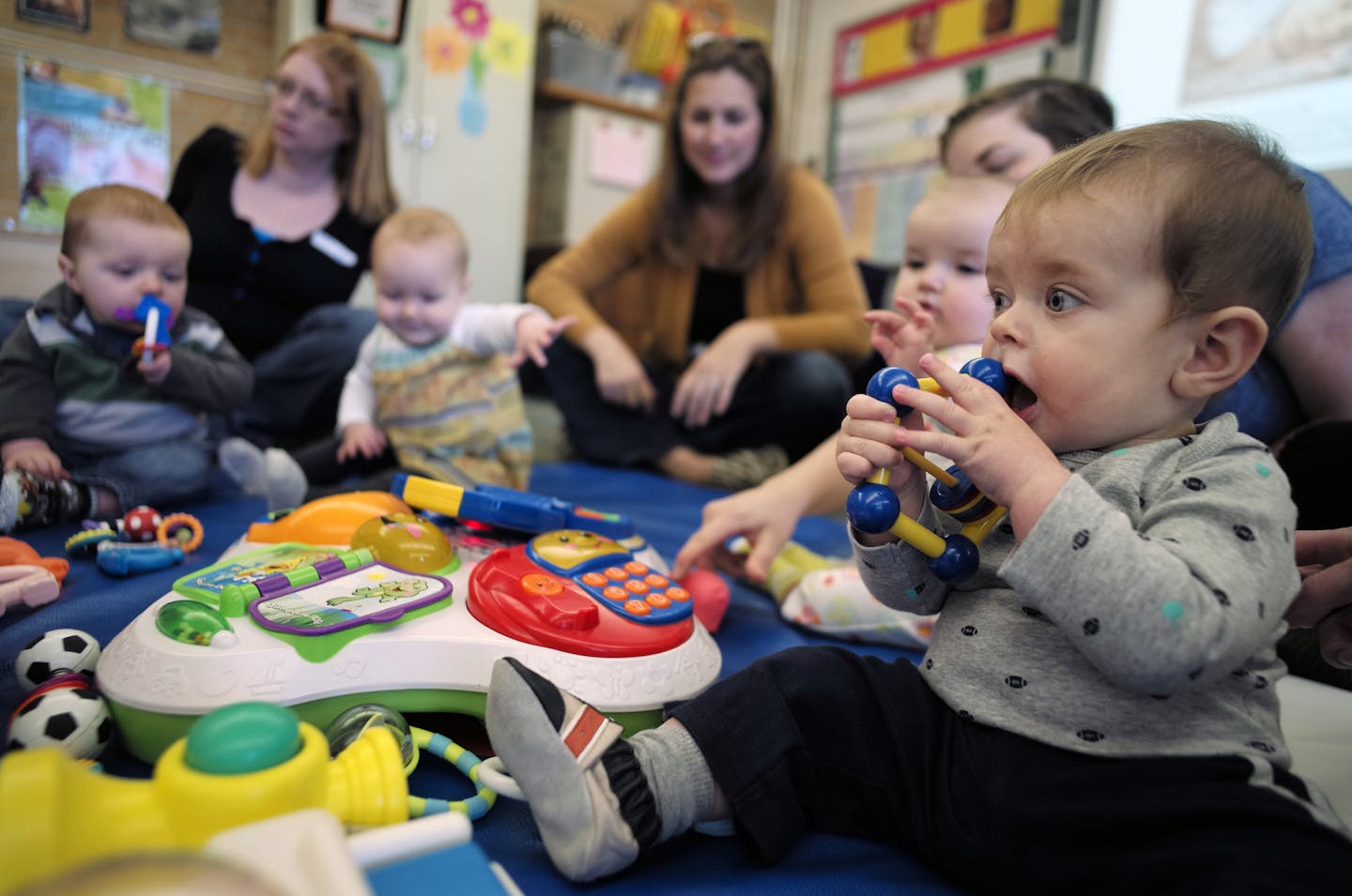 Jill's Swanson's son Drew, 7 months enjoys mouth on toys experience in a classroom.] The 40th anniversay of ECFE in the north west metro is coming up.Richard Tsong-Taatarii/rtsong- taatarii@startribune.com