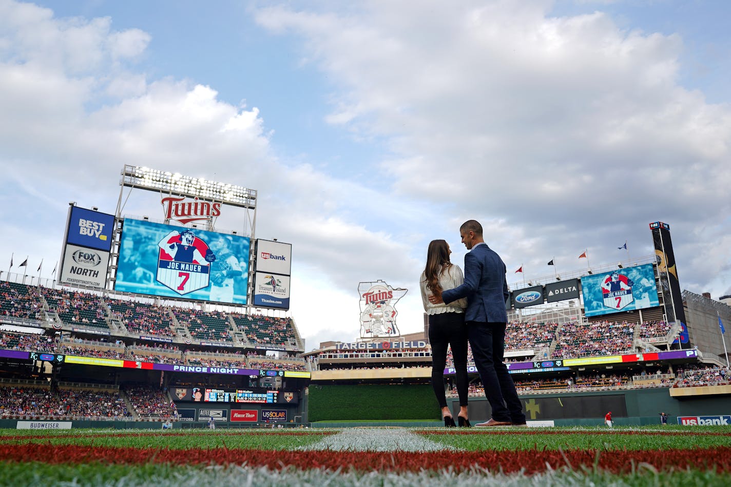 Former Minnesota Twins star Joe Mauer stood with his wife Maddie on the field during a video tribute after Gov. Tim Walz proclaimed Saturday Joe Mauer Day ahead of Friday night's game against the Kansas City Royals. ] ANTHONY SOUFFLE • anthony.souffle@startribune.com 



The Minnesota Twins played the Kansas City Royals in an MLB game Friday, June 14, 2019 at Target Field in Minneapolis.