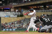 Minnesota Twins second baseman Luis Arraez (2) hits a single in the bottom of the fifth inning. The Minnesota Twins hosted the Chicago White Sox at Ta