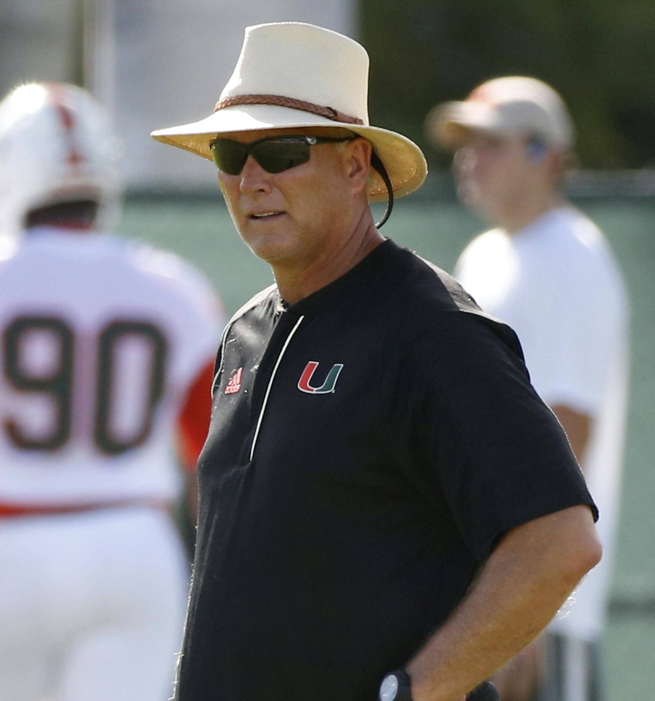 Miami head coach Mark Richt looks on during practice on the first day of NCAA college football fall camp, Tuesday, Aug. 1, 2017 in Coral Gables, Fla. (AP Photo/Wilfredo Lee) ORG XMIT: OTK