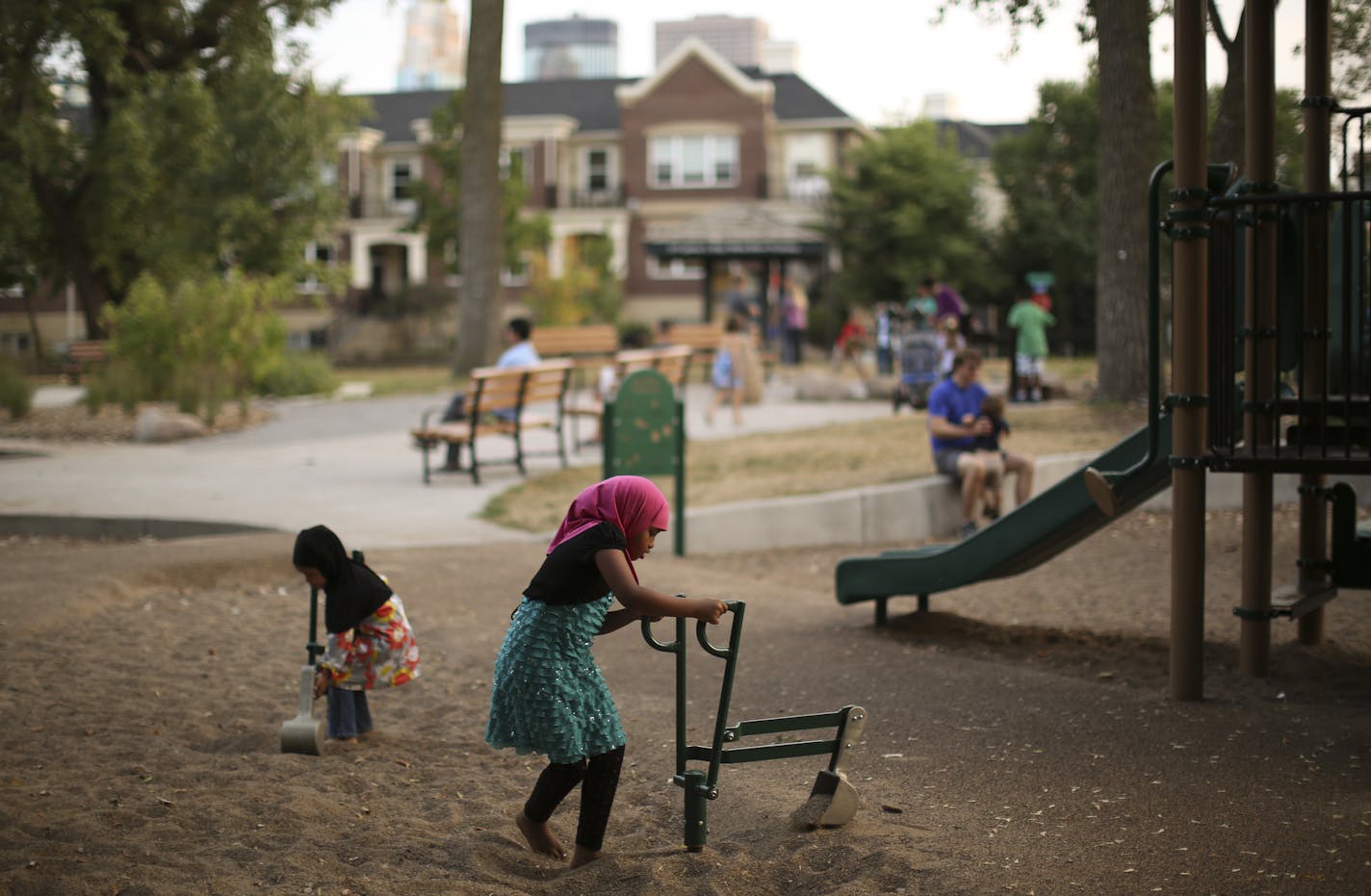 A combination of baby boomers, millennials and immigrants are choosing the denser living and urban lifestyle the city offers. Here, the North Loop Playground on West River Parkway in Minneapolis.