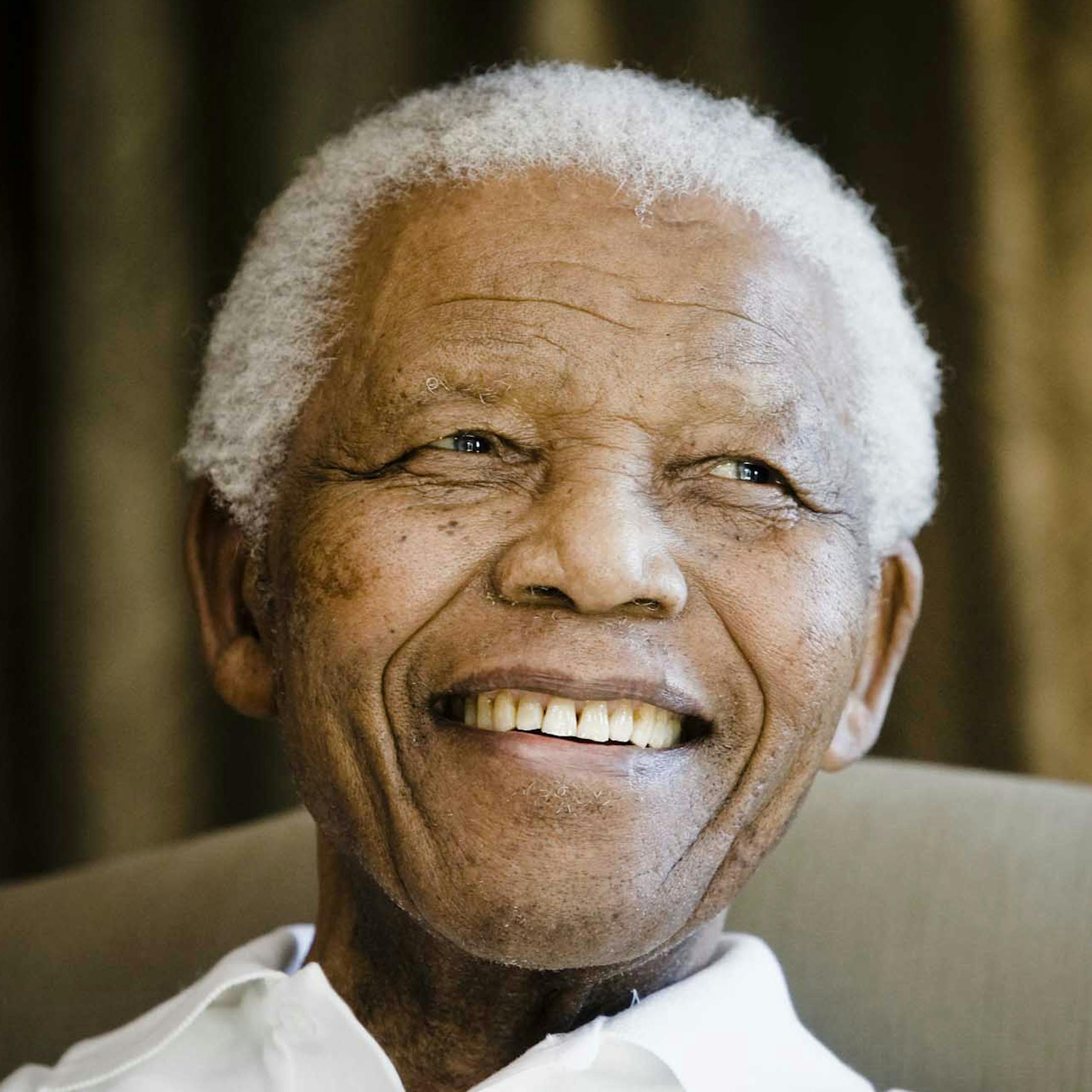 FILE - In this Tuesday, June 2, 2009 file photo, former South African President Nelson Mandela reacts at the Mandela foundation, in Johannesburg, South Africa, during a meeting with a group of American and South African students as part of a series of activities leading to Mandela Day on July 18th. Israel's state archive has published a 50-year-old letter stating that the Mossad spy service unwittingly offered paramilitary training to a young Nelson Mandela in 1962, and released a number of othe