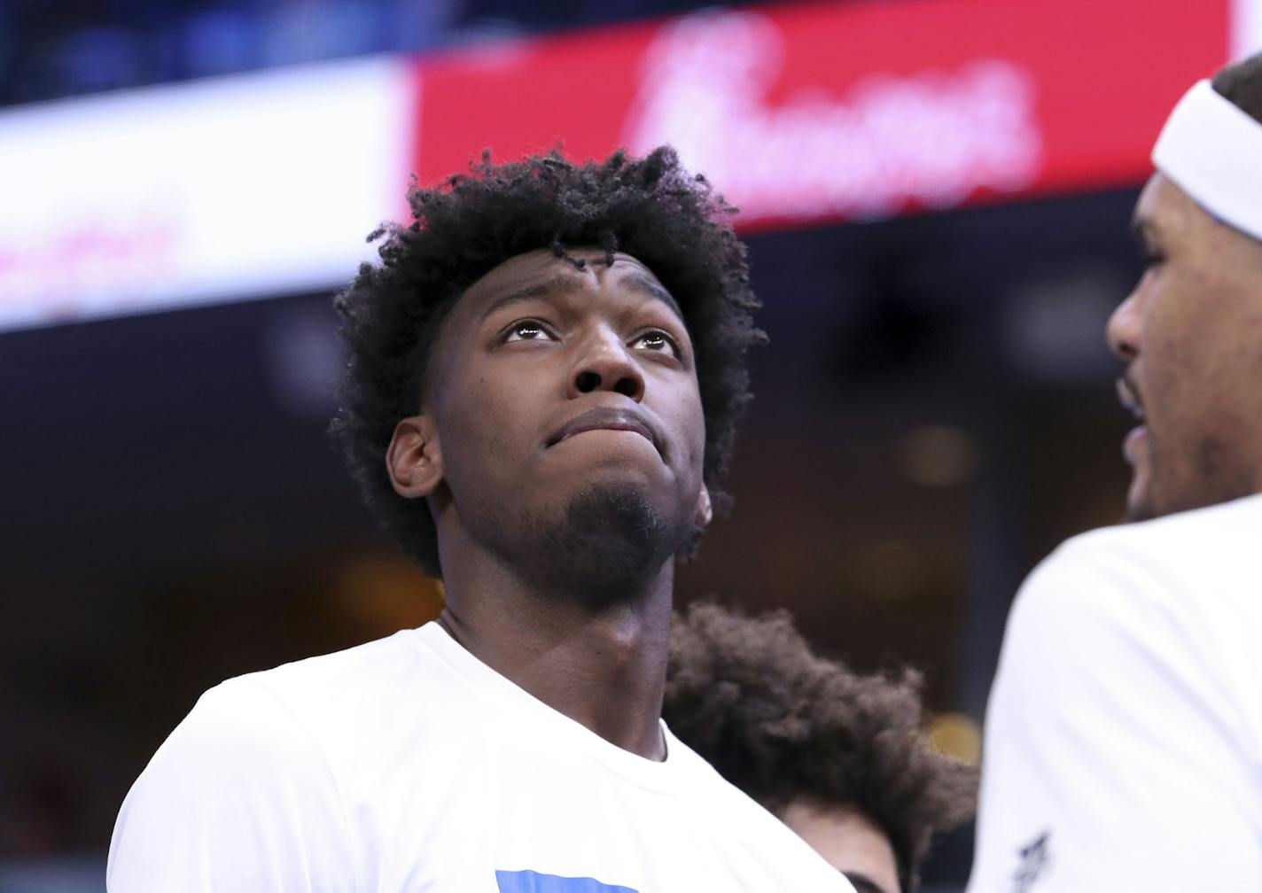 FILE - In this Tuesday, Dec. 3, 2019, file photo, Memphis' James Wiseman pauses during a timeout in the second half of an NCAA college basketball game against Bradley, in Memphis, Tenn. Wiseman is the headliner of the big men in the NBA draft on Wednesday, Nov. 18, 2020, and is expected to go in the top three picks. (AP Photo/Karen Pulfer Focht, File)