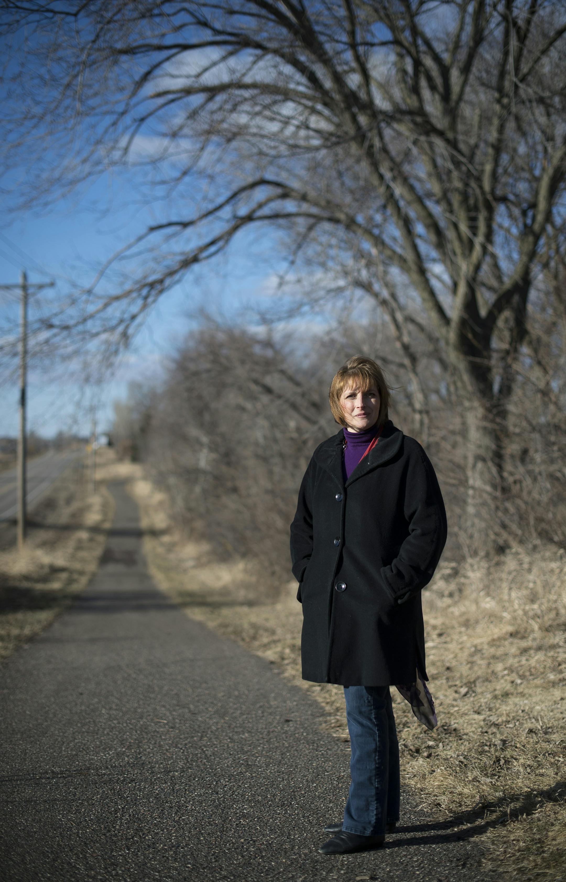 Michelle Sylvander is photographed on the trail that goes through the Clearwater Creek neighborhood on Thursday afternoon. ] (Aaron Lavinsky | StarTribune) Old mattresses, ratty couches, junky refrigerators, mounds of grass clippings and rotting food have all ended up in the wetlands and open space of Lino Lakes. It happens more often than you think, says KC Kye, Lino Lakes Recycling Program Assistant. To stop illegal dumping, the city started hosting an annual recycling day each spring and smal