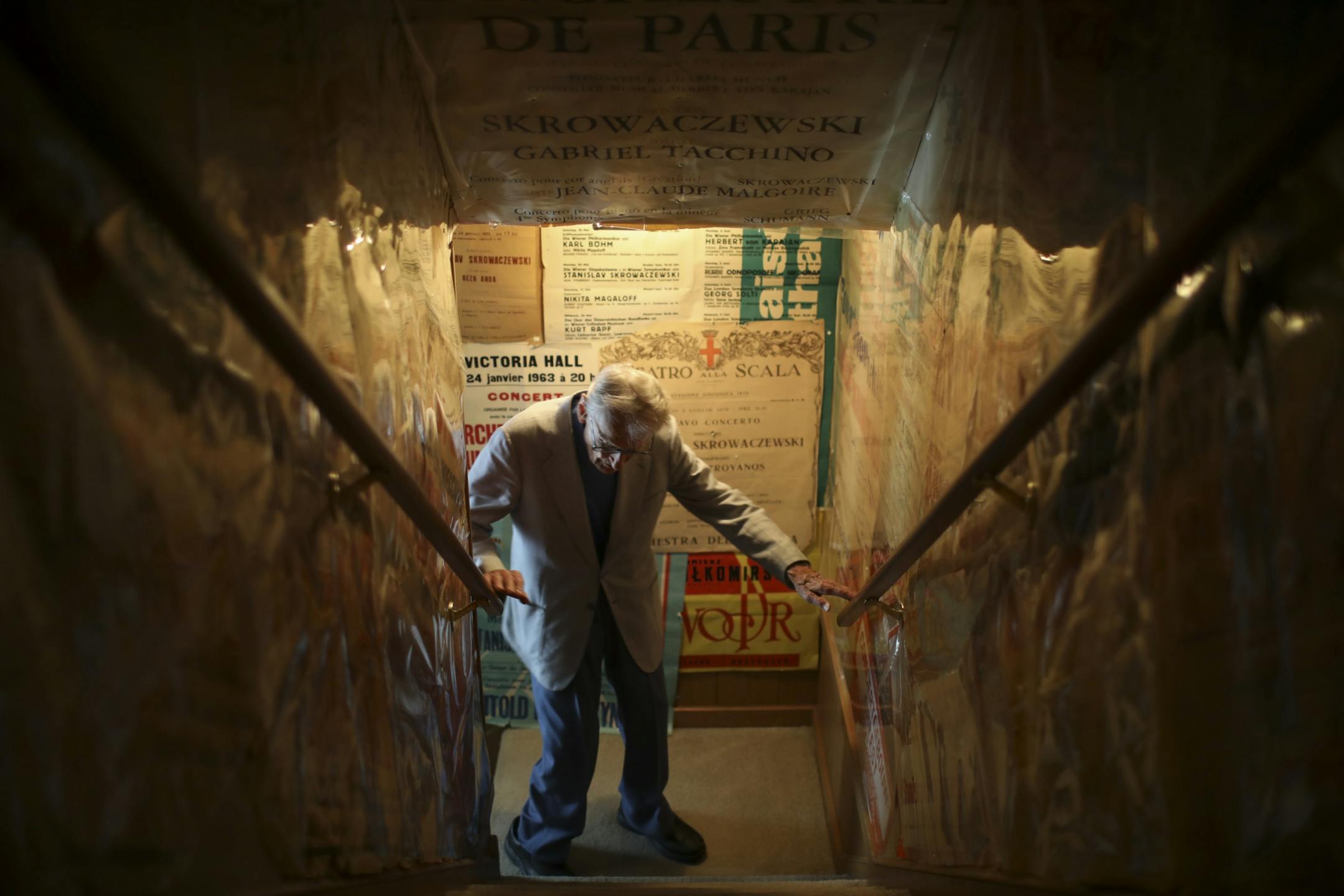 Minnesota Orchestra Conductor Laureate Stanislaw Skrowaczewski lined the stairway leading to his music room with posters from halls around the world where he has conducted.