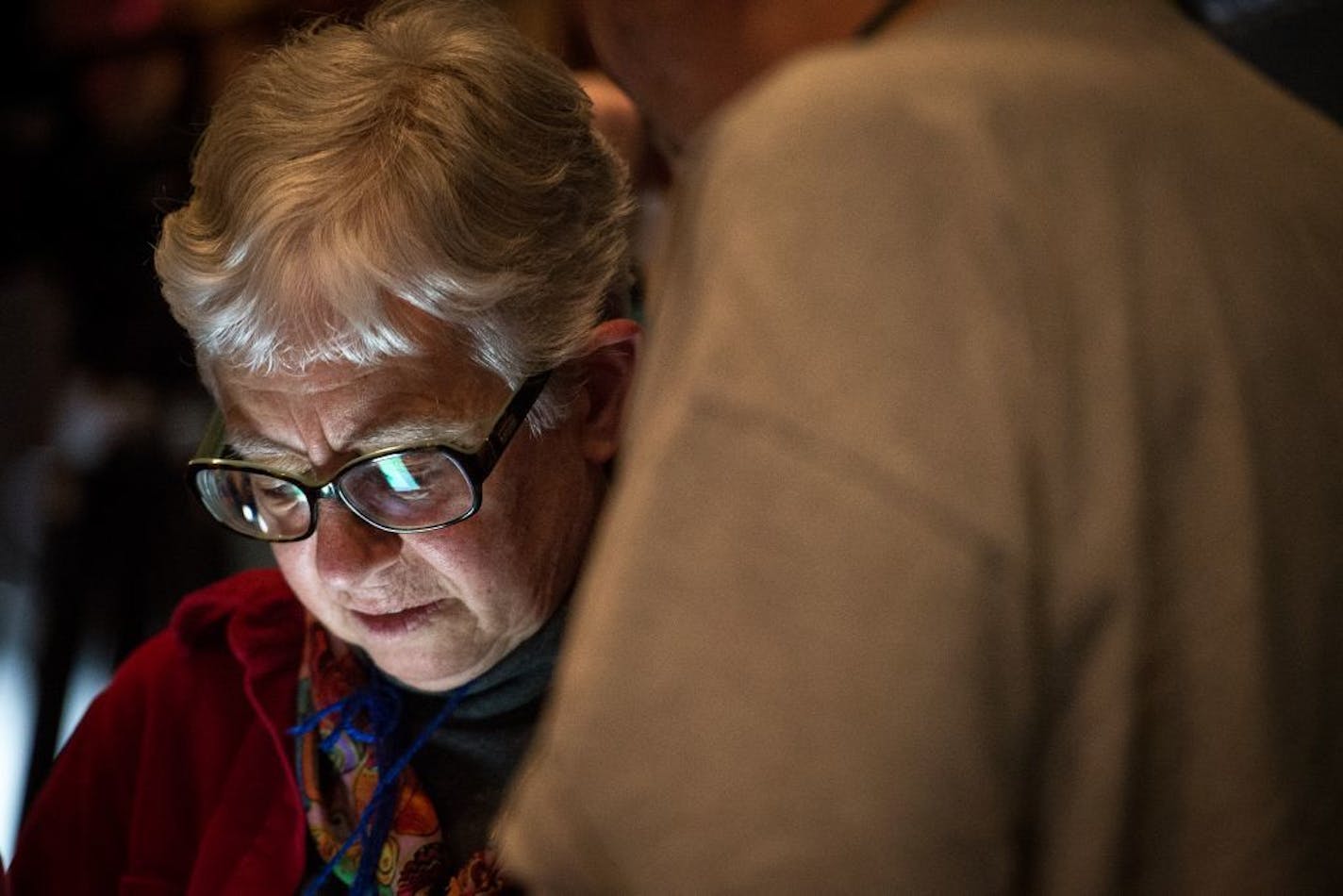 DFL Rep. Phyllis Kahn checked her phone April 9, 2016, between the first and second nominee voting rounds Saturday at the DFL convention.