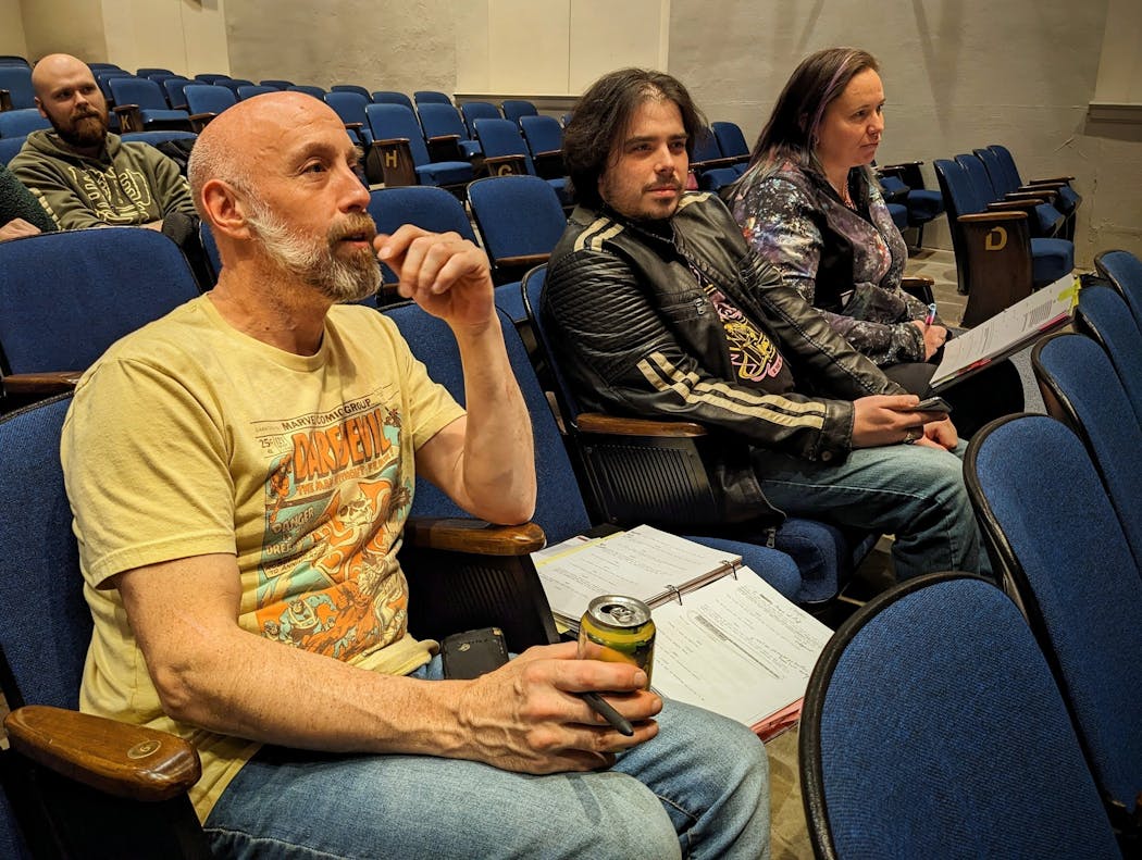 St. Cloud resident Anthony Schrock, left, watched rehearsal Nov. 2 of the play he wrote and is directing, “Ebenezer’s Dry Goods & Pharmaceuticals.”
