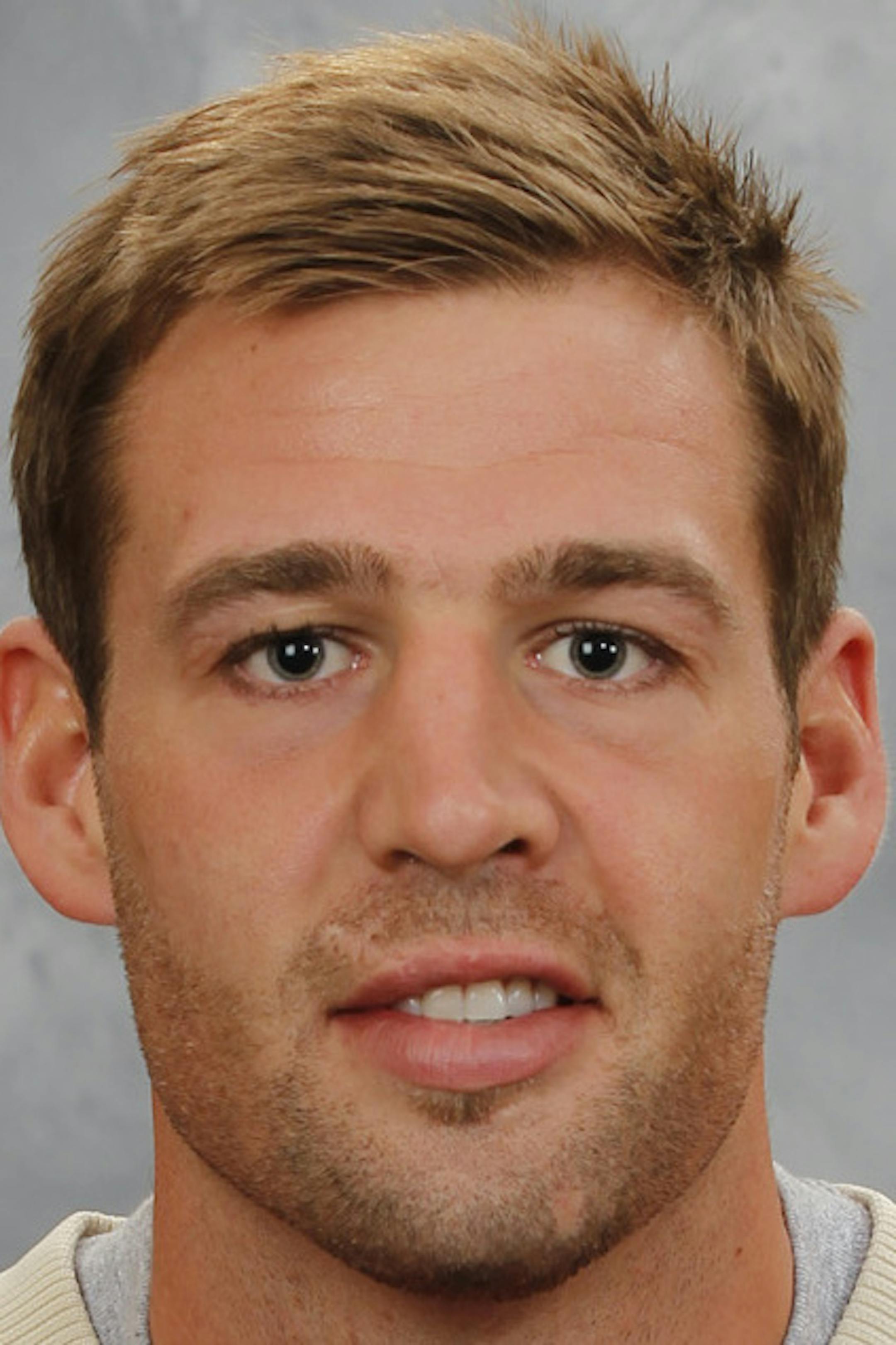 ST. PAUL, MN ‚Äì SEPTEMBER 11: Clayton Stoner of the Minnesota Wild poses for his official headshot for the 2013-2014 season on September 11, 2013 at the Xcel Energy Center in Saint Paul, Minnesota. (Photo by Andy King/NHLI via Getty Images) *** Local Caption *** Clayton Stoner ORG XMIT: 177614294