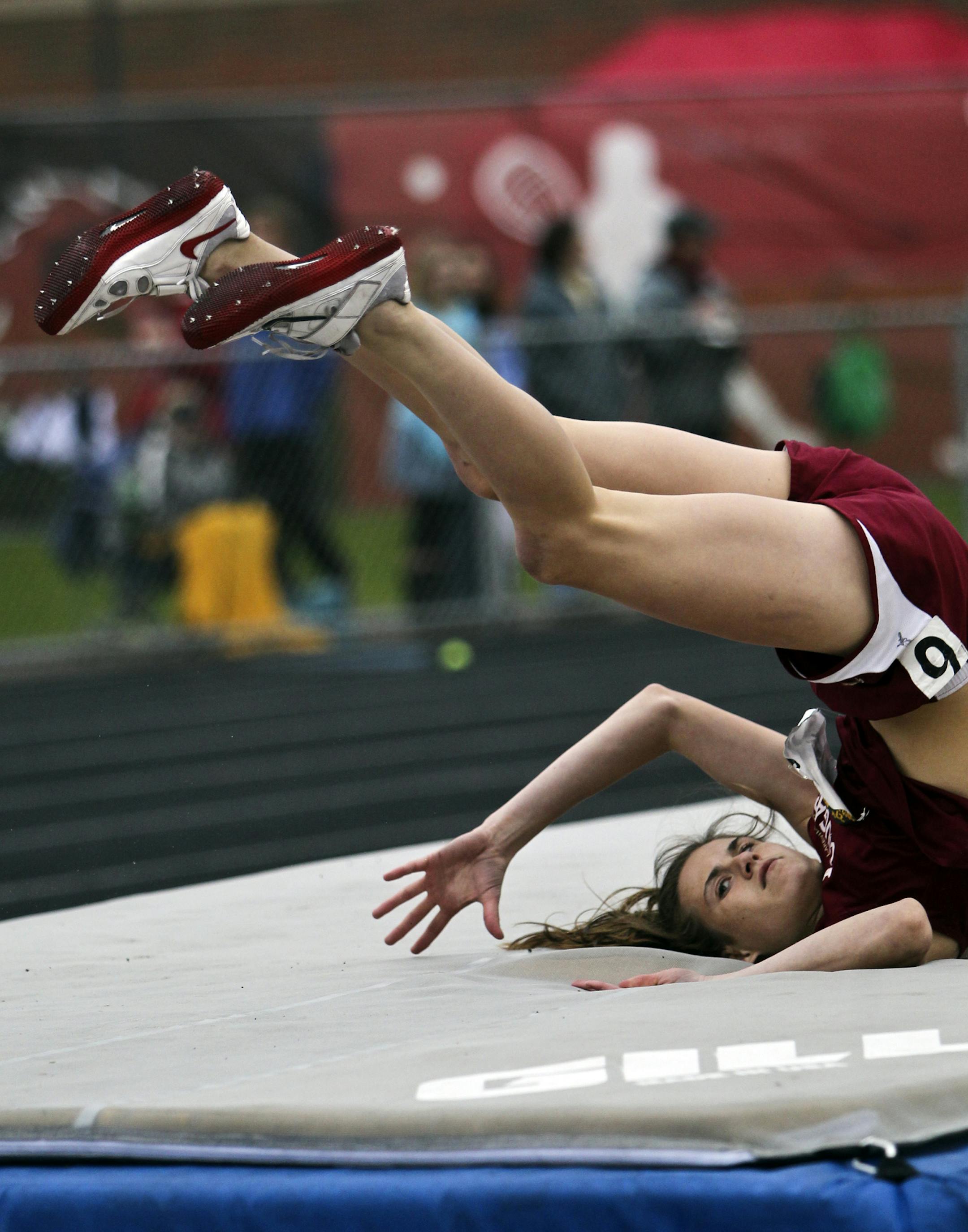 Lakeville South's Caraline Slattery (137) lands after clearing the bar in the long jump during the 3A True team track state meet Friday, May 17, 2013 at Stillwater High in Stillwater, MN.](DAVID JOLES/STARTRIBUNE) djoles@startribune.com True team track state meet for Class 3A Friday, May 17, 2013 at Stillwater High in Stillwater, MN.**Caraline Slattery,cq ORG XMIT: MIN1305171923170352