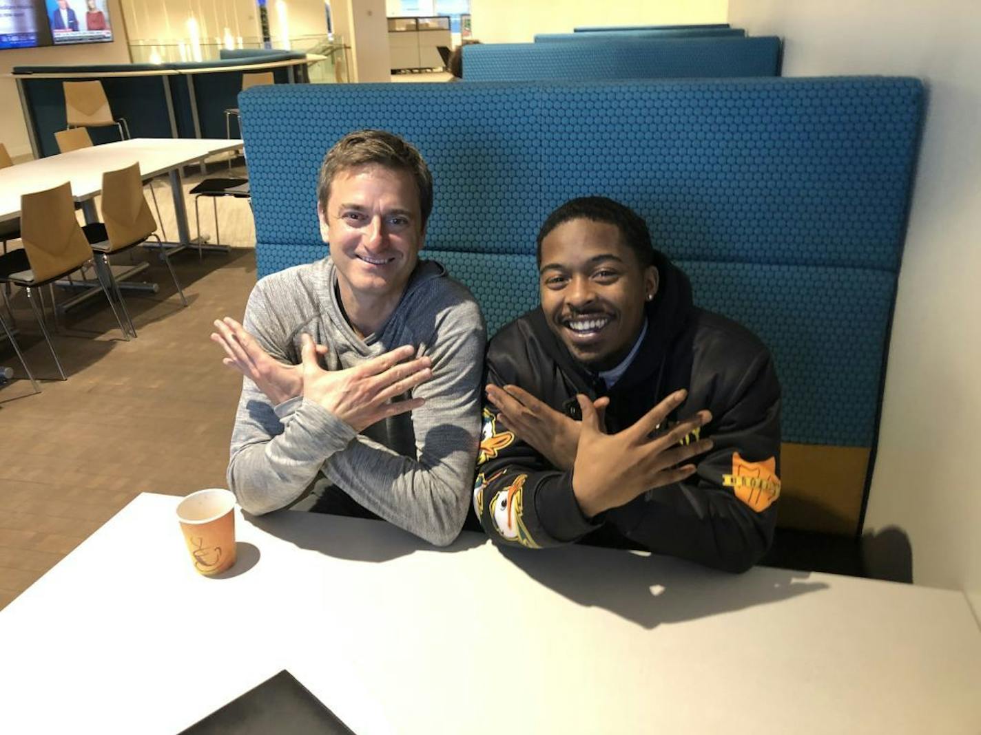 Don MacPherson and Shakeel Nelson, buddies for 17 years, have expanded their relationship to include dozens of young people through Inner City Ducks. Photo: Neal.St. Anthony@startribune.com