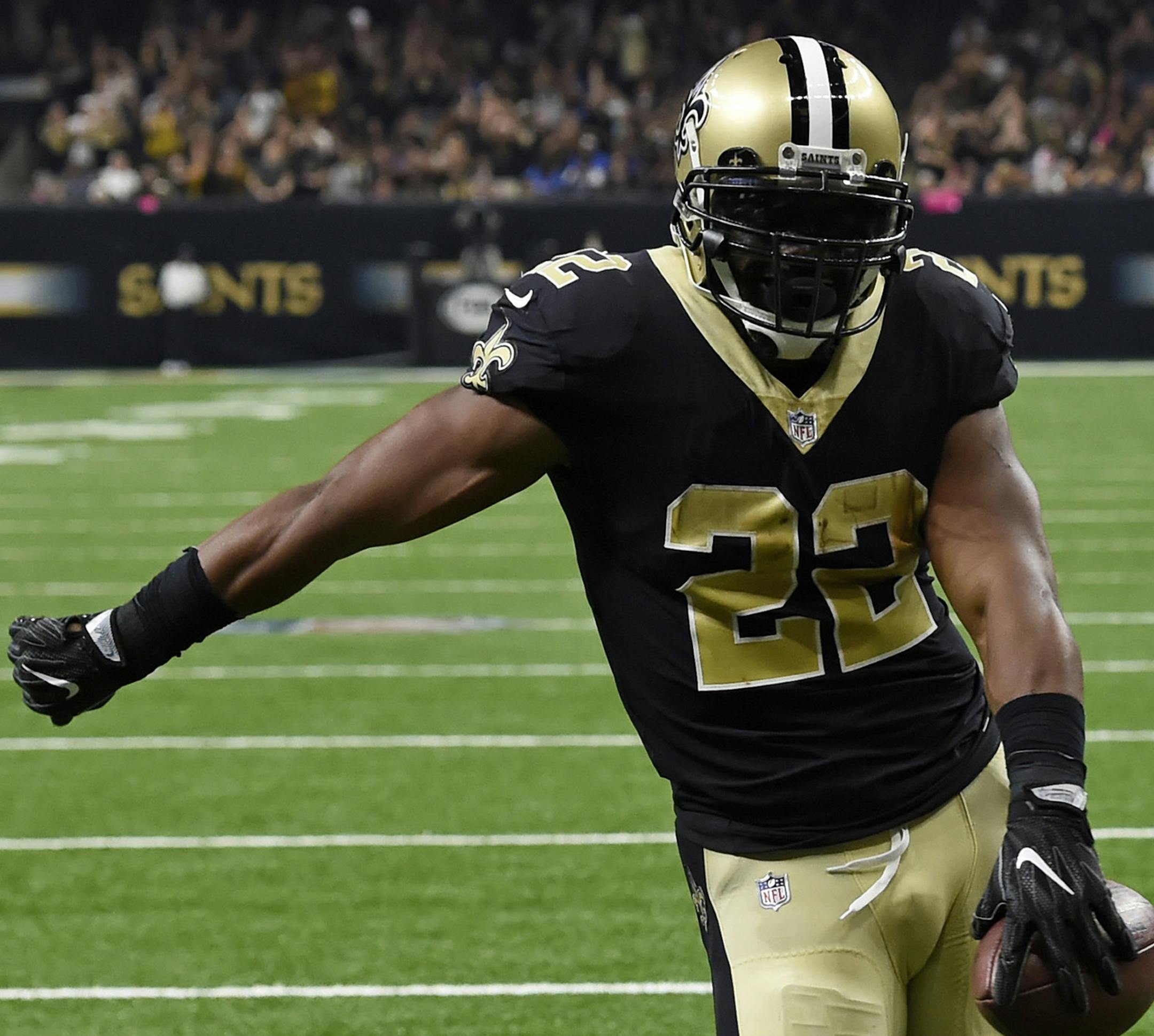 New Orleans Saints running back Mark Ingram (22) celebrates his touchdown in the first half of an NFL football game against the Detroit Lions in New Orleans, Sunday, Oct. 15, 2017. (AP Photo/Bill Feig)