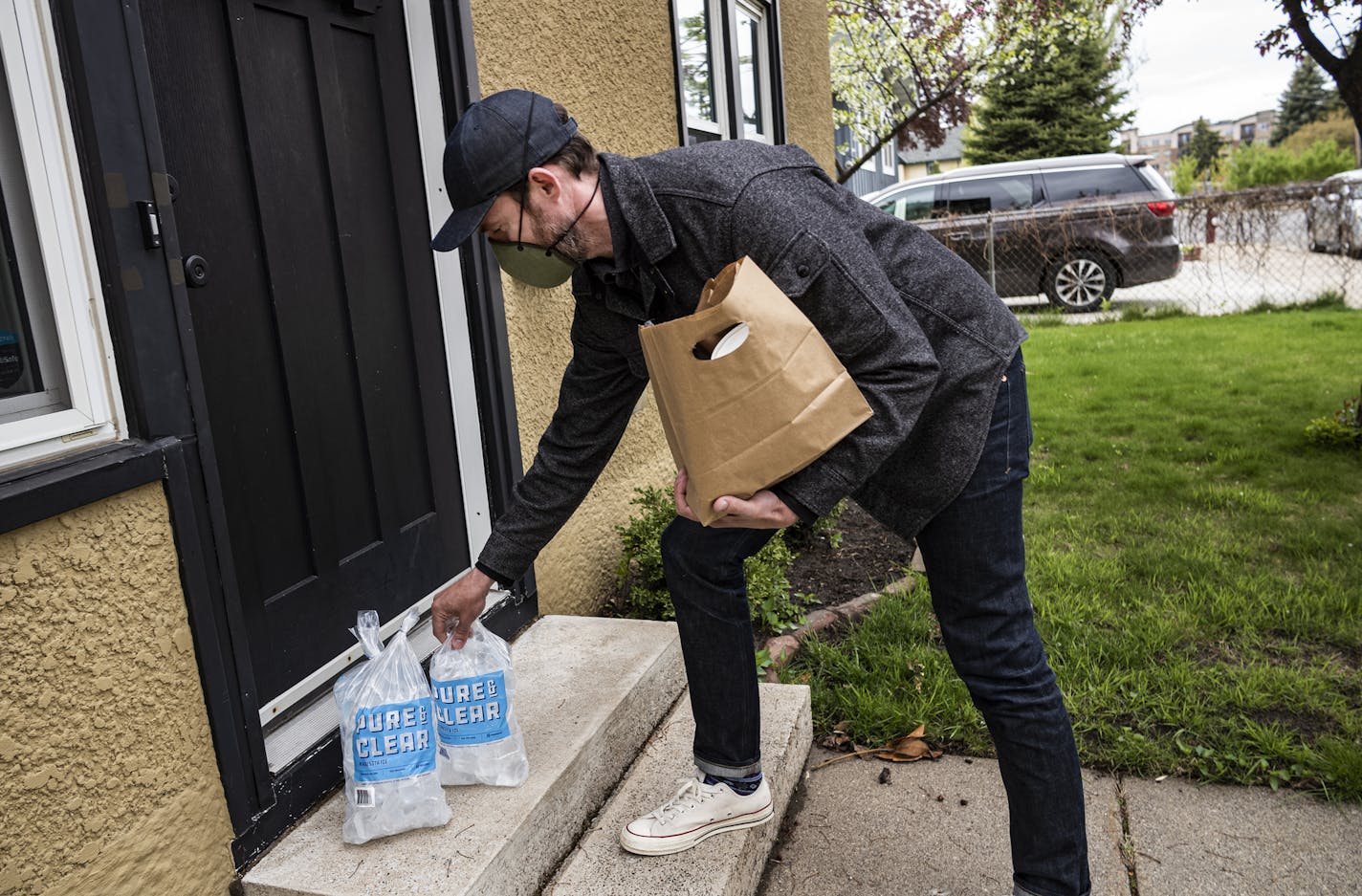 Above, instead of delivering ice to bars and restaurants, Erik Eastman of Minnesota Ice uses its refrigerated trucks to bring a variety of products from restaurants and bars to consumers.