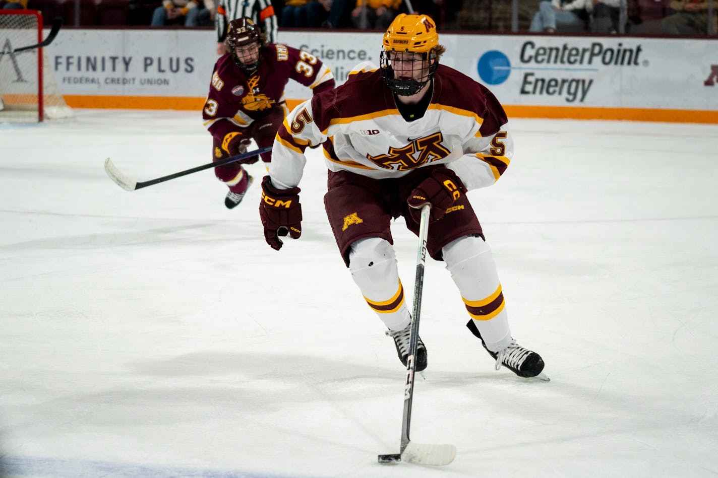 Minnesota defenseman Sam Rinzel (5) controls the puck at the game against The University of Minnesota Duluth in 3M Arena at Mariucci in Minneapolis, Minn. on Friday, Nov. 3, 2023. ] Angelina Katsanis • angelina.katsanis@startribune.com