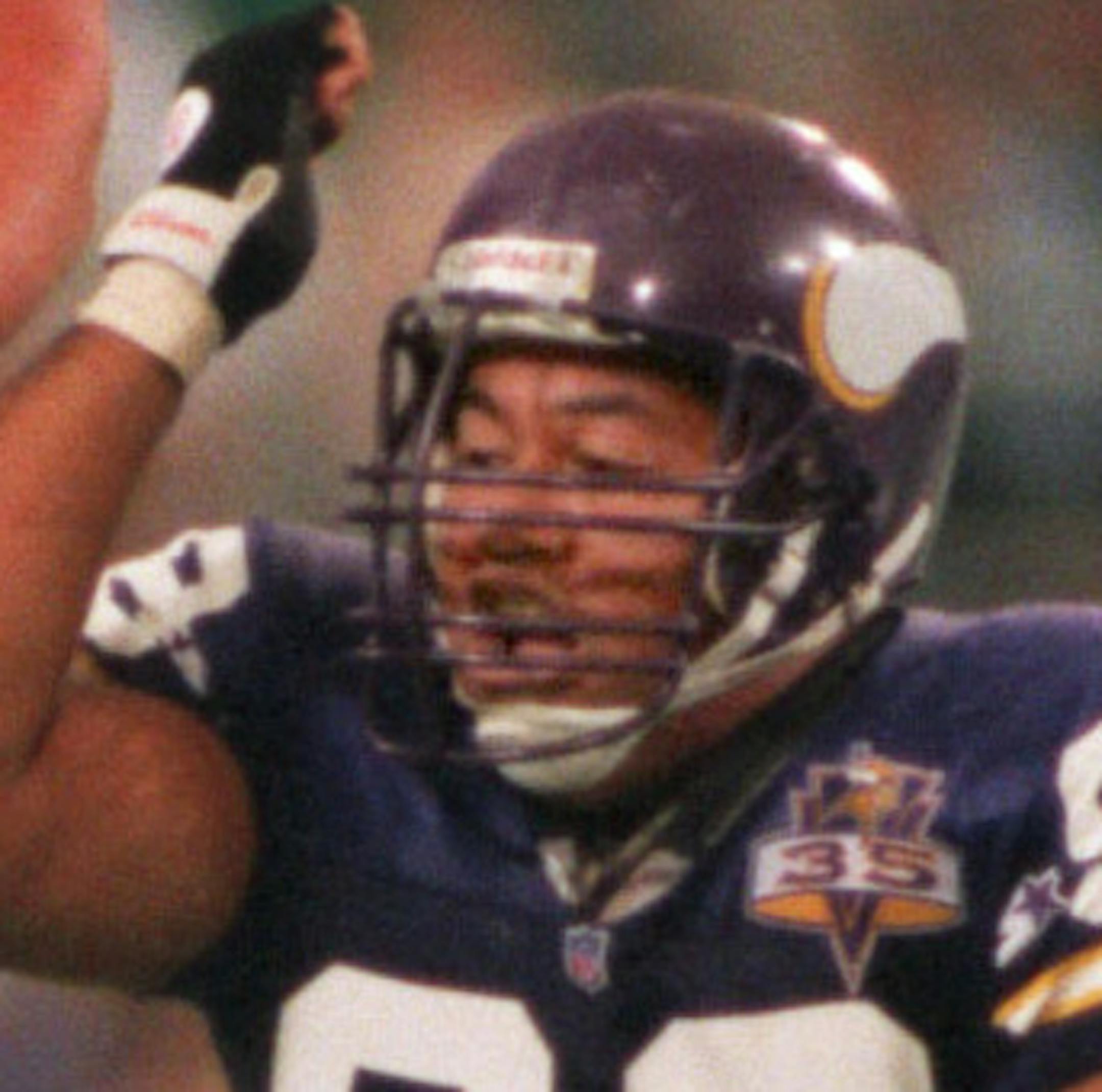 Vikings Esera Tuaolo celebrates after dropping Detroit's Barry Sanders for a loss in the 4th quarter. // Final score was Minnesota Vikings 20, Detroit Lions 10. ORG XMIT: MIN2015122416471629