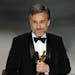 Christoph Waltz accepts the Oscar for best performance by an actor in a supporting role for "Inglourious Basterds."