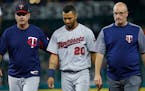 Twins left fielder Eddie Rosario had to be helped off the field in the fourth inning of Monday night's victory over Detroit.
