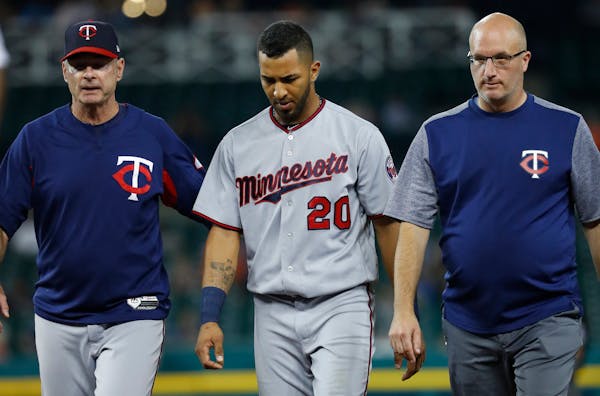 Twins left fielder Eddie Rosario had to be helped off the field in the fourth inning of Monday night's victory over Detroit.