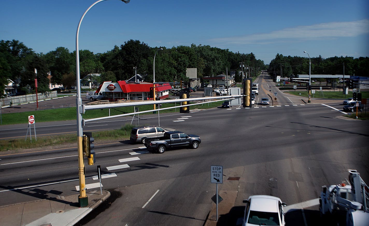 Vehicles travel at a very high rate of speed as they travel along Hwy. 36 (road left to right), where it intersects Hwy. 120, Century Ave. in North St. Paul. The intersection was the scene Thursday night, where a woman pushing her son in a stroller was hit and killed as she crossed Hwy. 36.