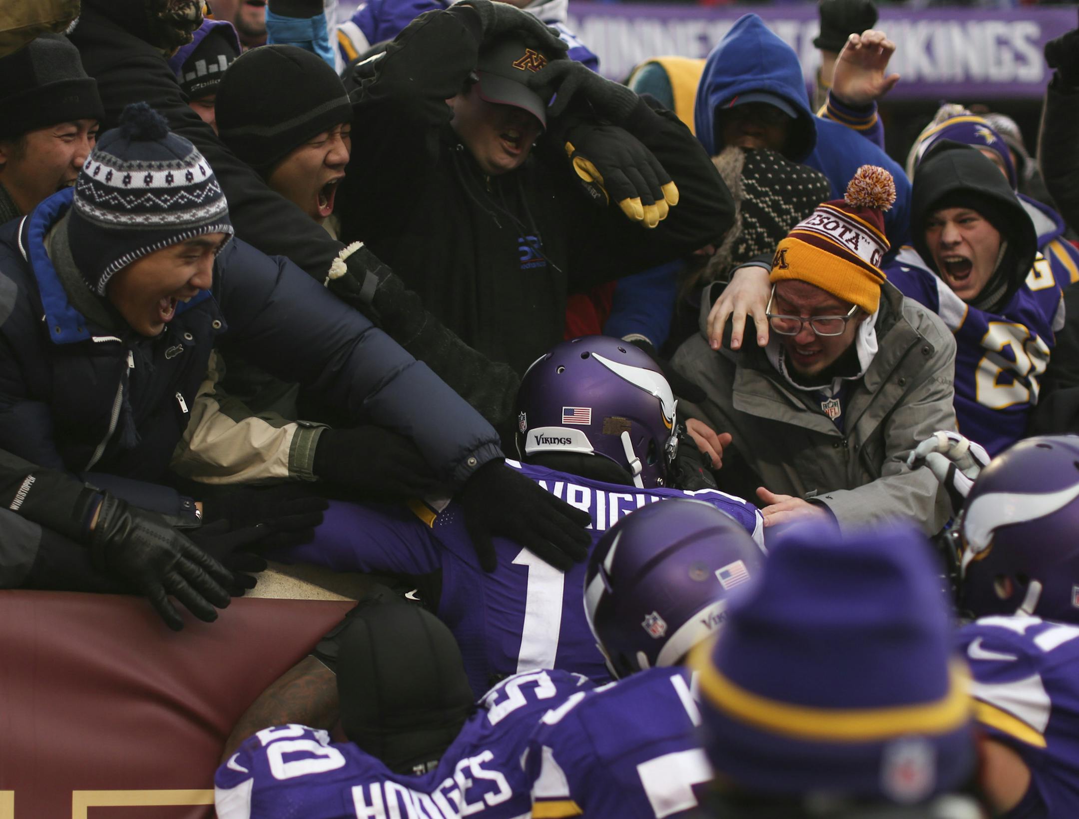 Minnesota Vikings wide receiver Jarius Wright (17) was congratulated by fans in the end zone after his 87 yard touchdown reception in overtime Sunday afternoon. ] JEFF WHEELER ‚Ä¢ jeff.wheeler@startribune.com The Minnesota Vikings beat the New York Jets 30-24 in overtime in an NFL football game Sunday afternoon, December 7, 2014 at TCF Bank Stadium in Minneapolis.