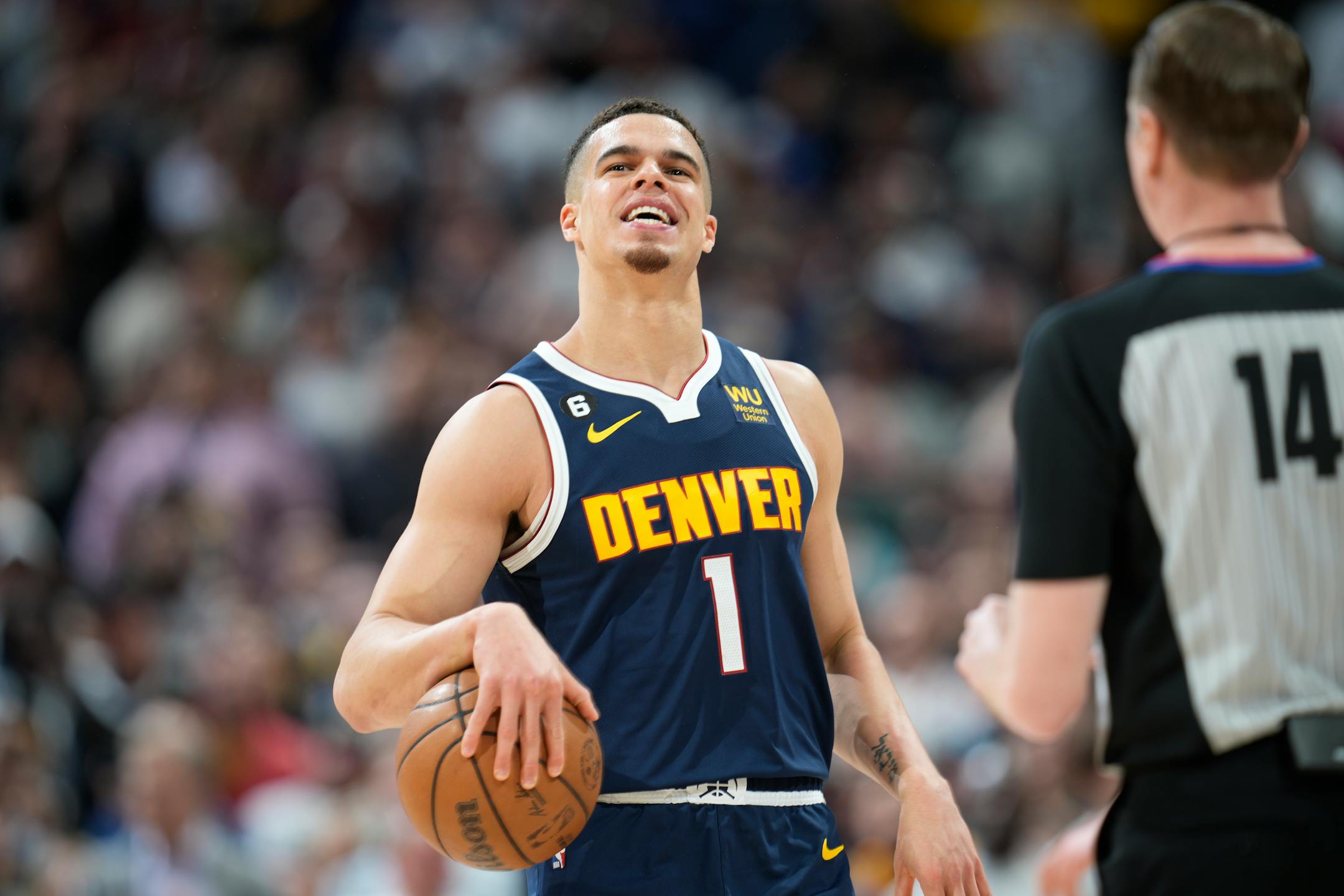 Denver Nuggets forward Michael Porter Jr. reacts in the closing seconds of Game 2 of the team's NBA basketball first-round playoff series win over the Minnesota Timberwolves.